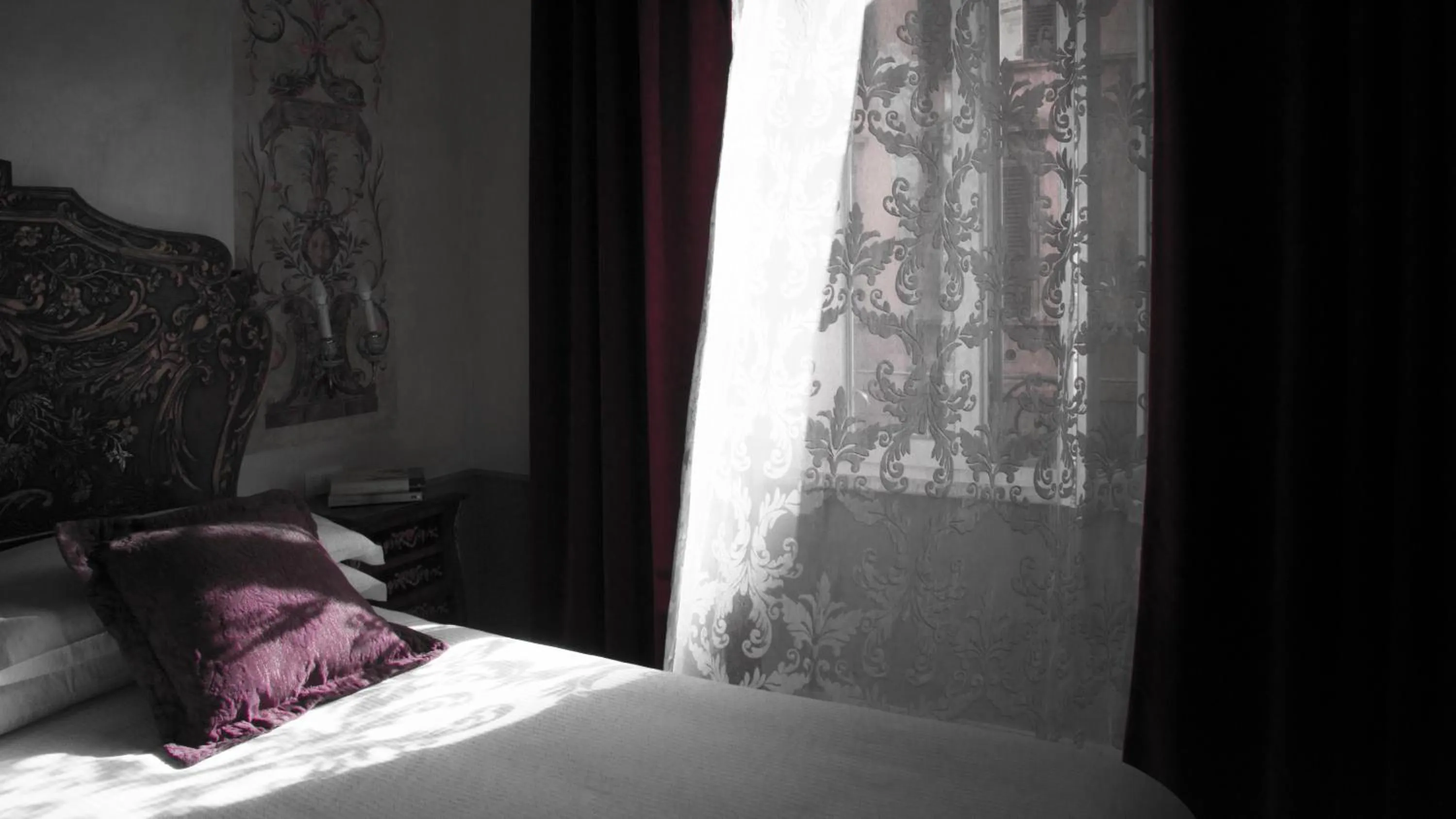 Bed in Ripetta Rooms