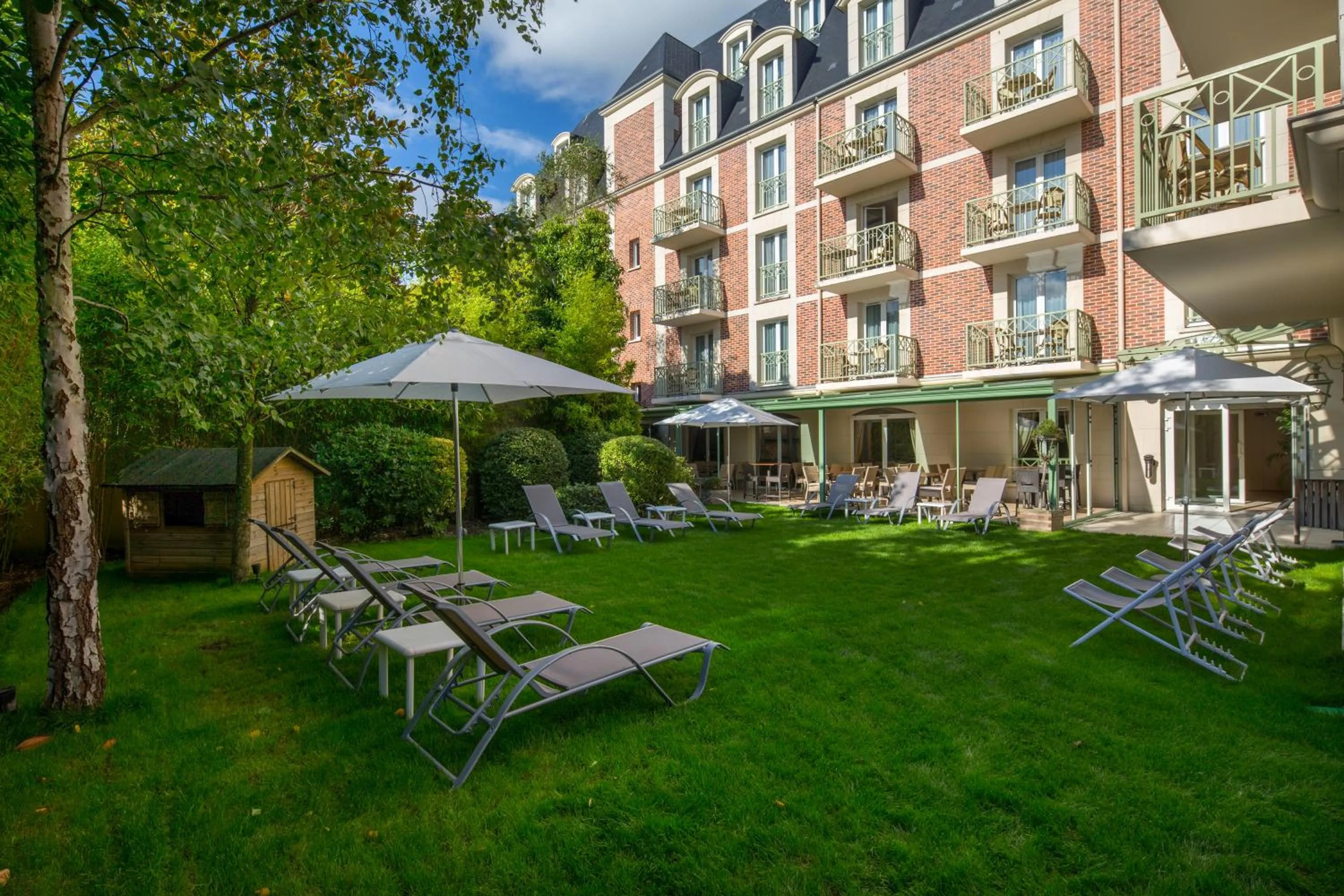 Garden in La Closerie SPA & Résidence Hôtel