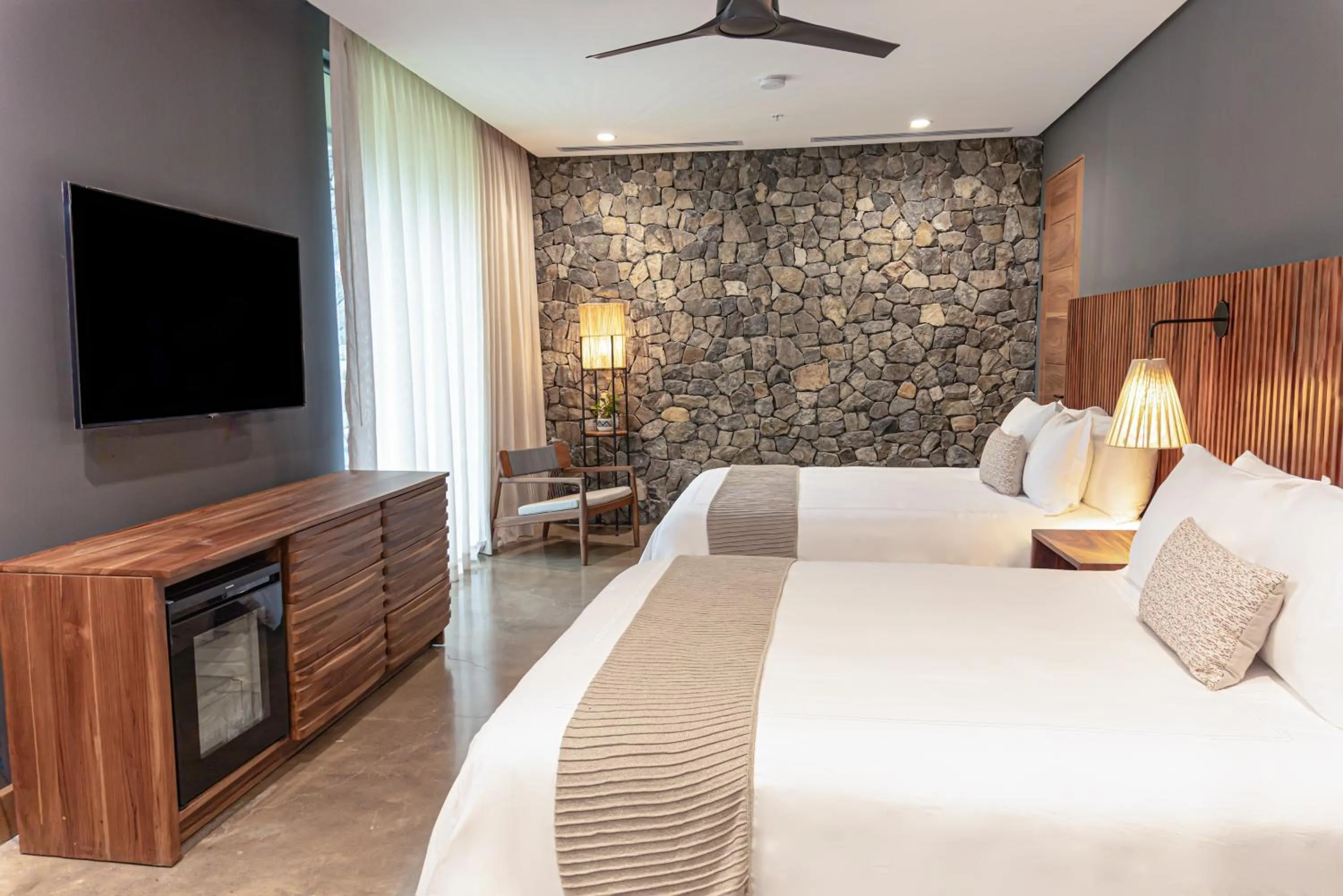 Photo of the whole room, Bed in El Mangroove Papagayo, Autograph Collection