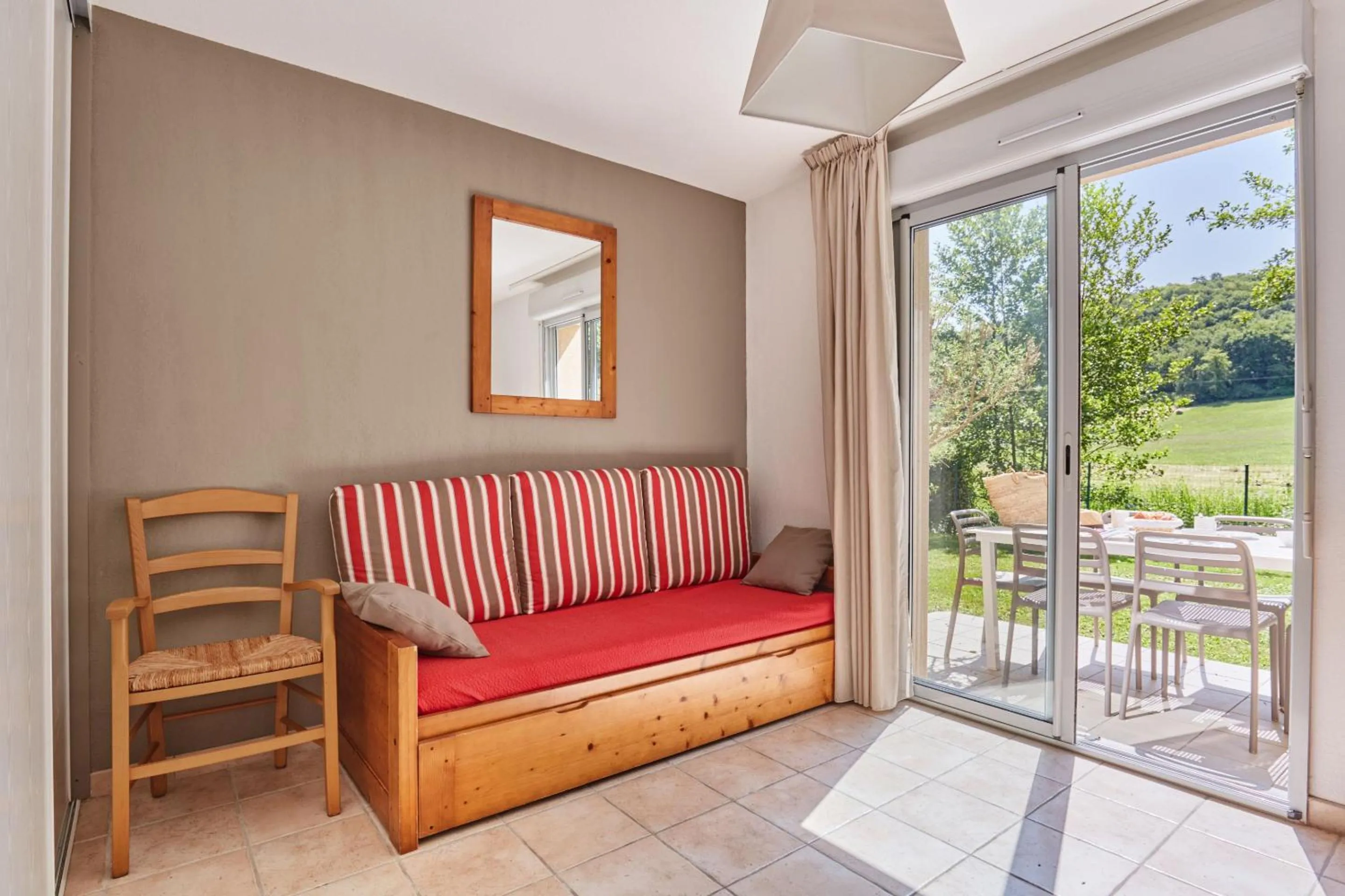 Seating area in Résidence Odalys Le Hameau du Moulin