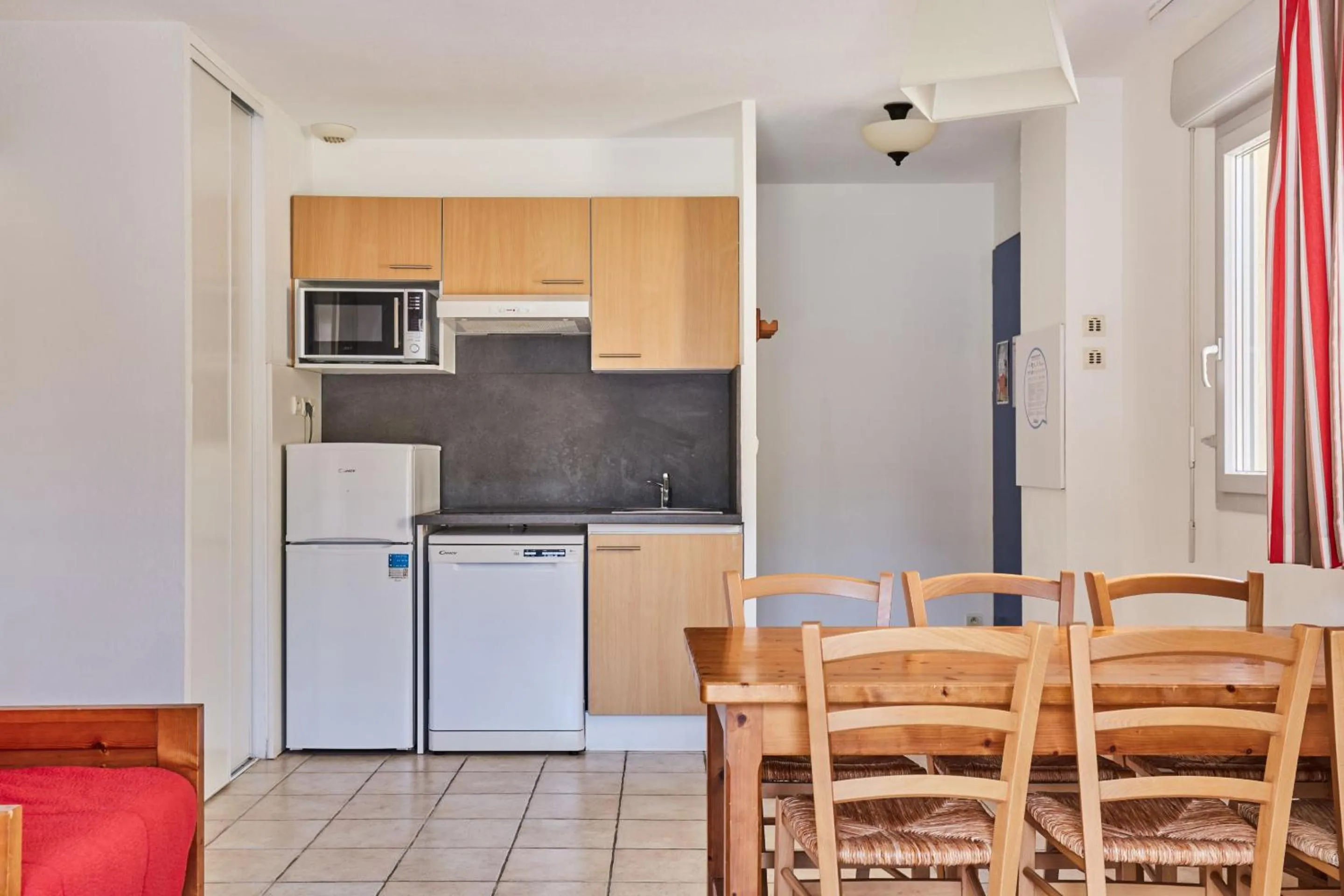 Kitchen or kitchenette in Résidence Odalys Le Hameau du Moulin