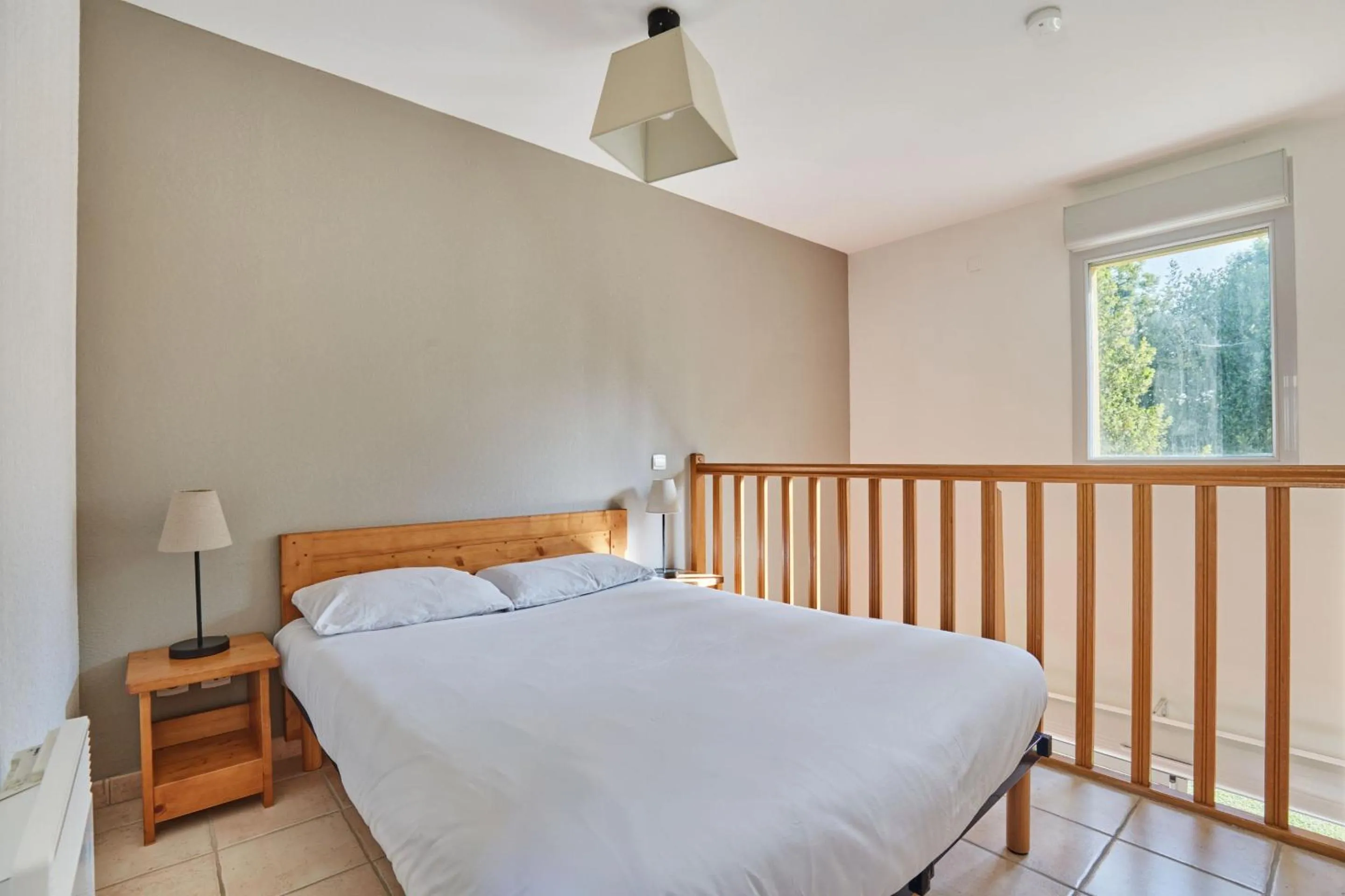 Bedroom, Bed in Résidence Odalys Le Hameau du Moulin