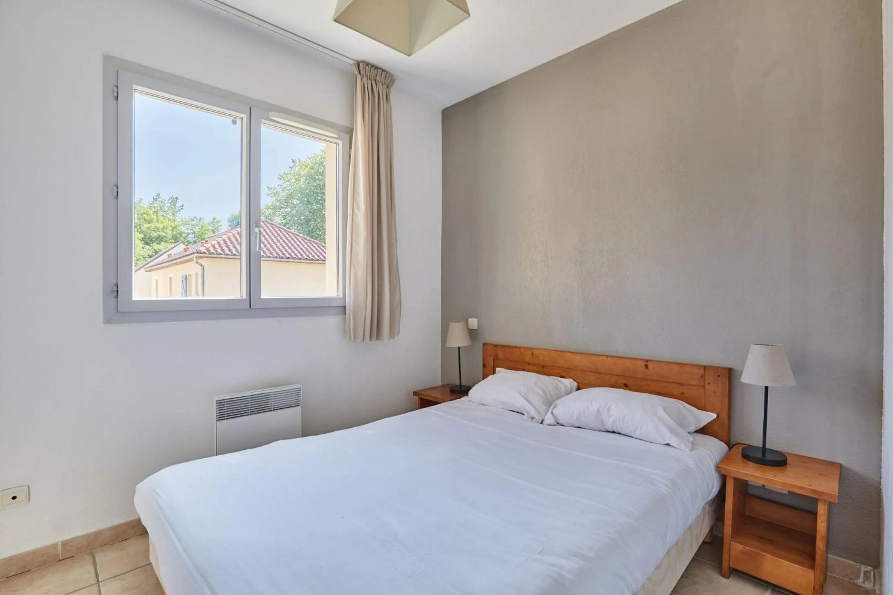 Bedroom, Bed in Résidence Odalys Le Hameau du Moulin