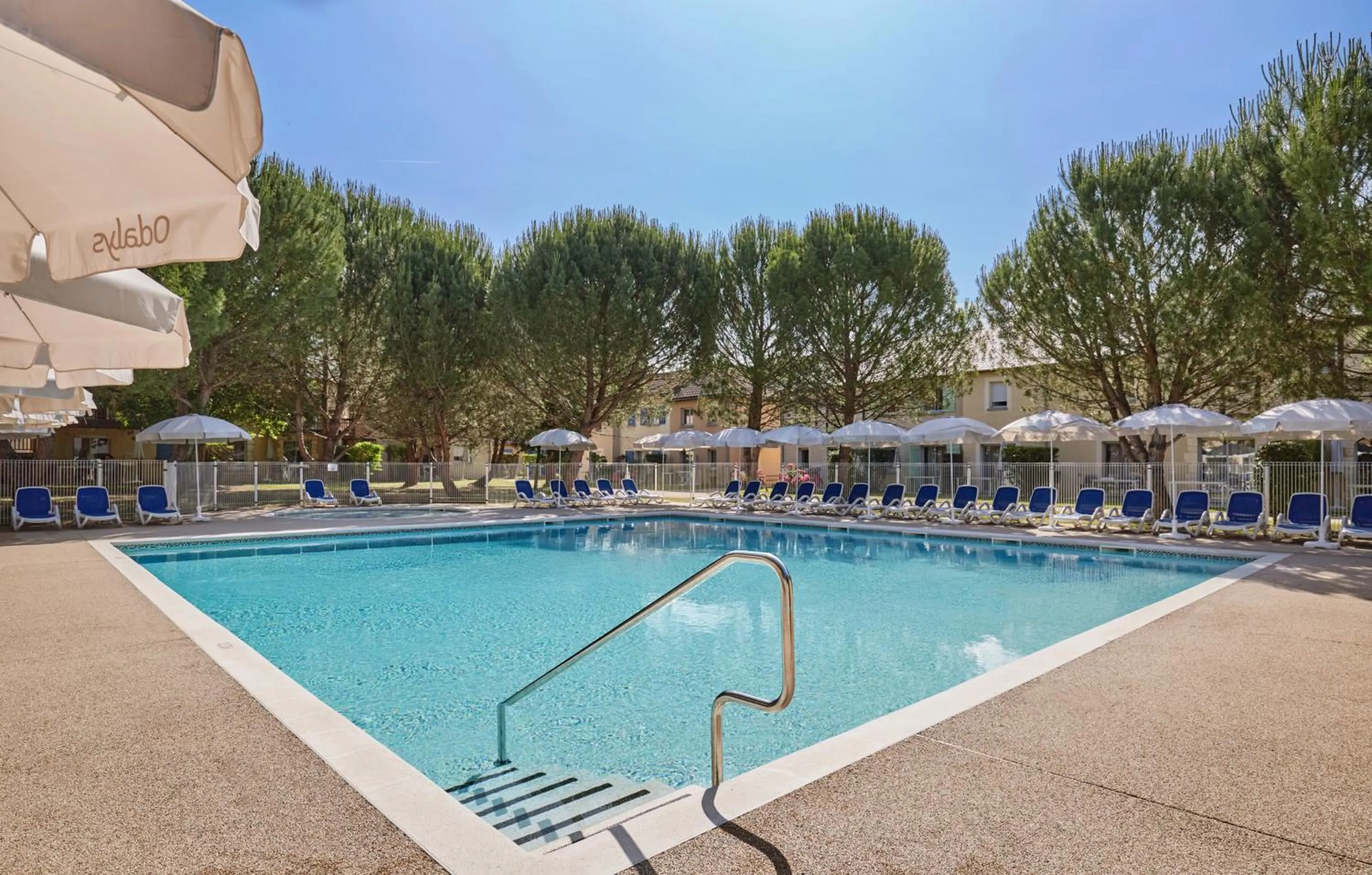 Swimming pool in Résidence Odalys Le Hameau du Moulin