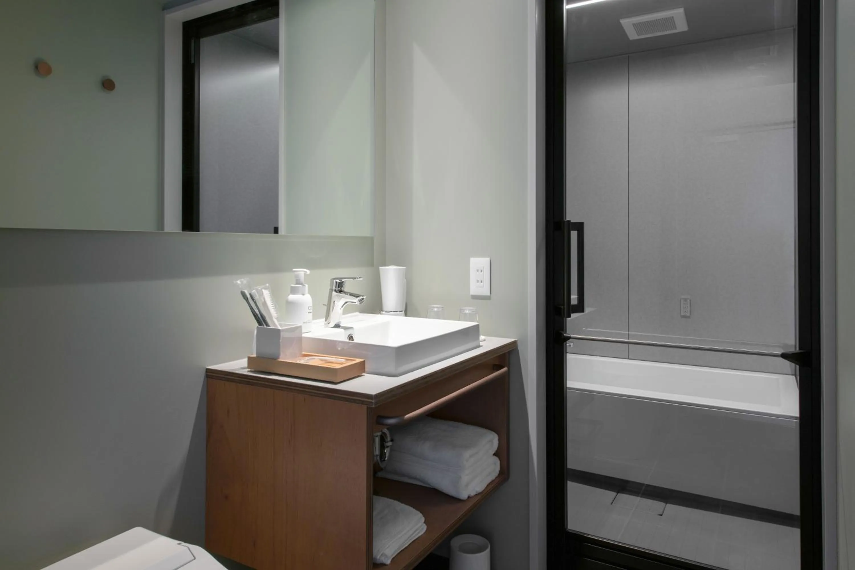 Photo of the whole room, Bed in KAIKA Tokyo by THE SHARE HOTELS