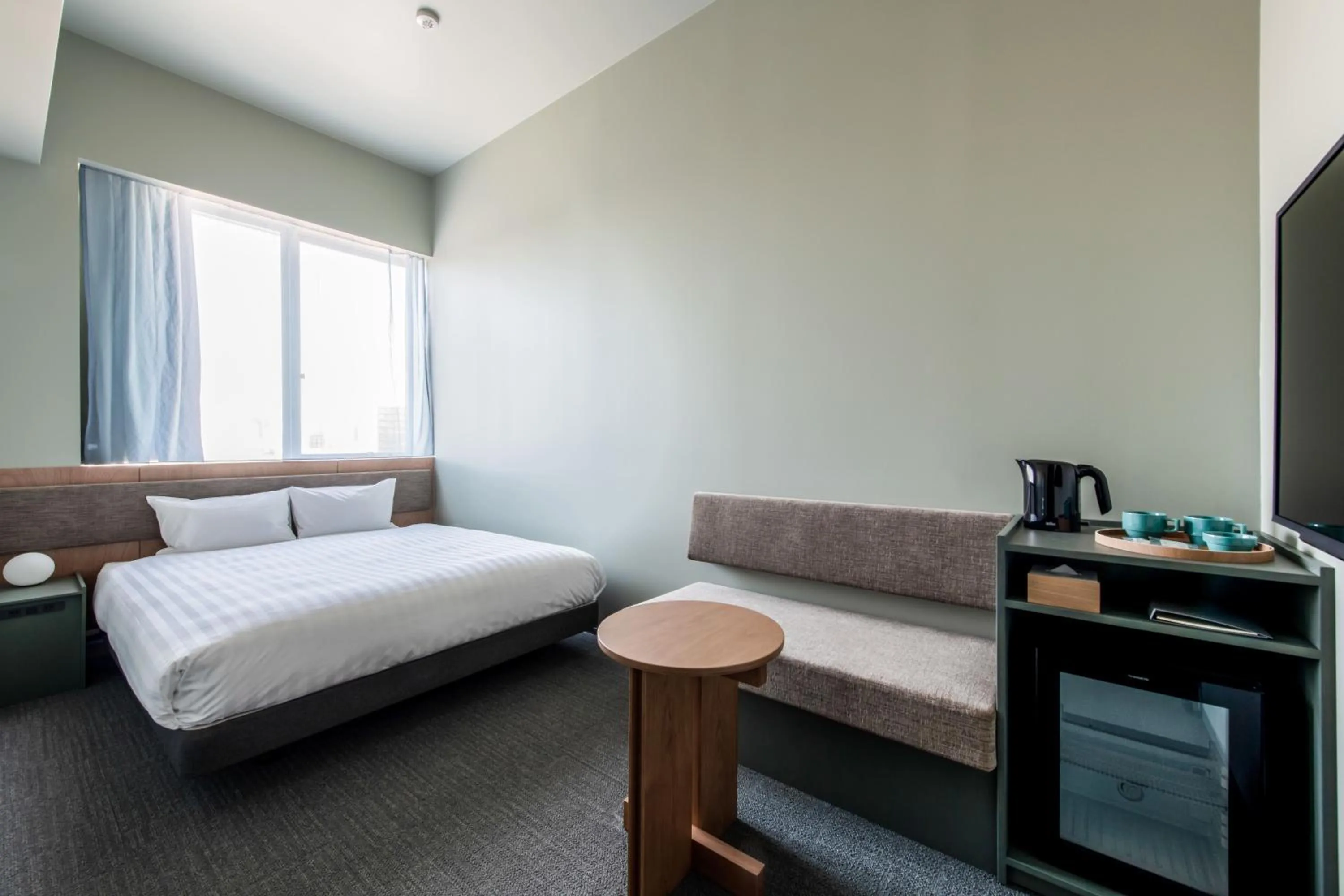Photo of the whole room, Bed in KAIKA Tokyo by THE SHARE HOTELS