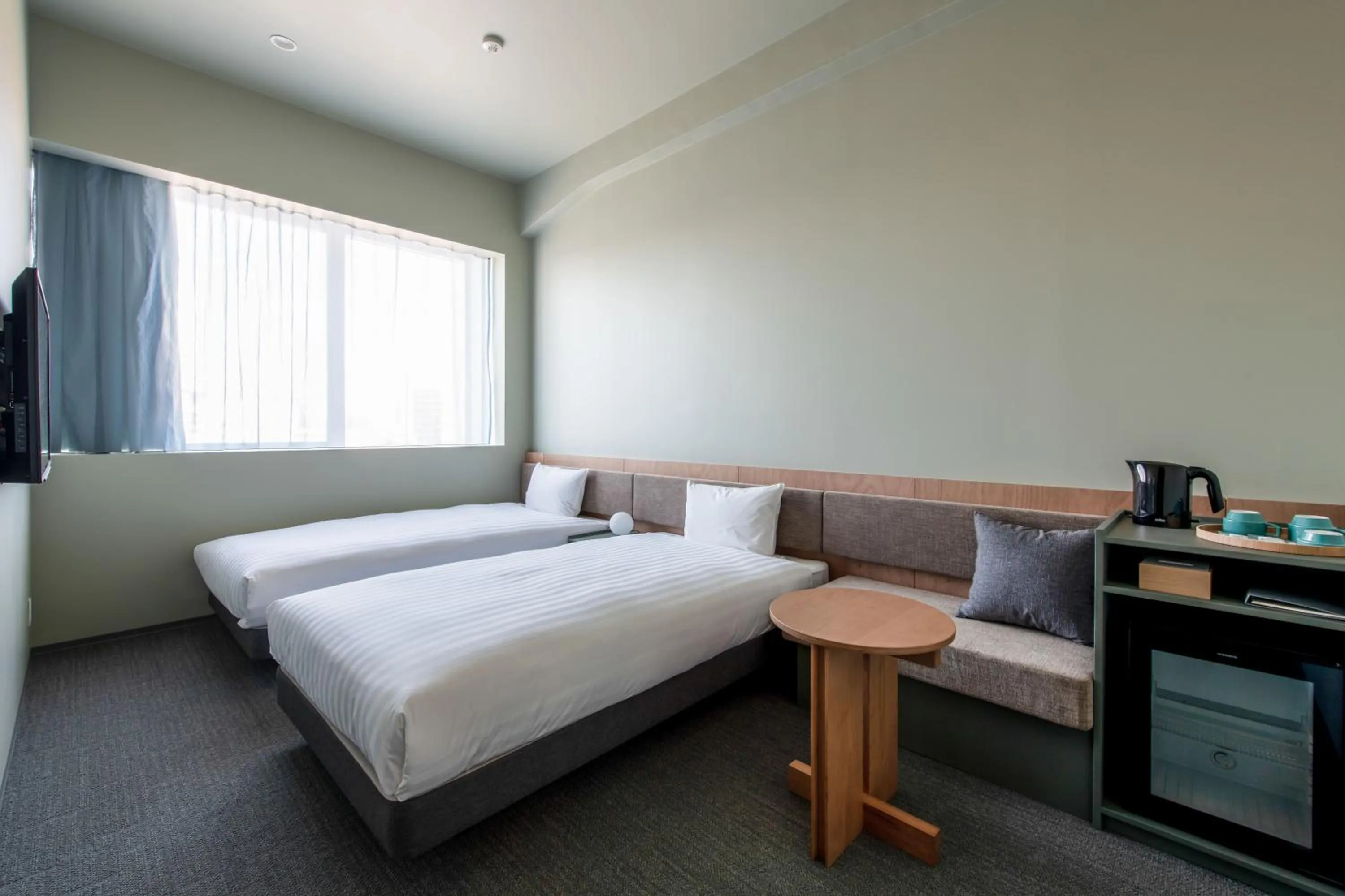 Photo of the whole room, Bed in KAIKA Tokyo by THE SHARE HOTELS