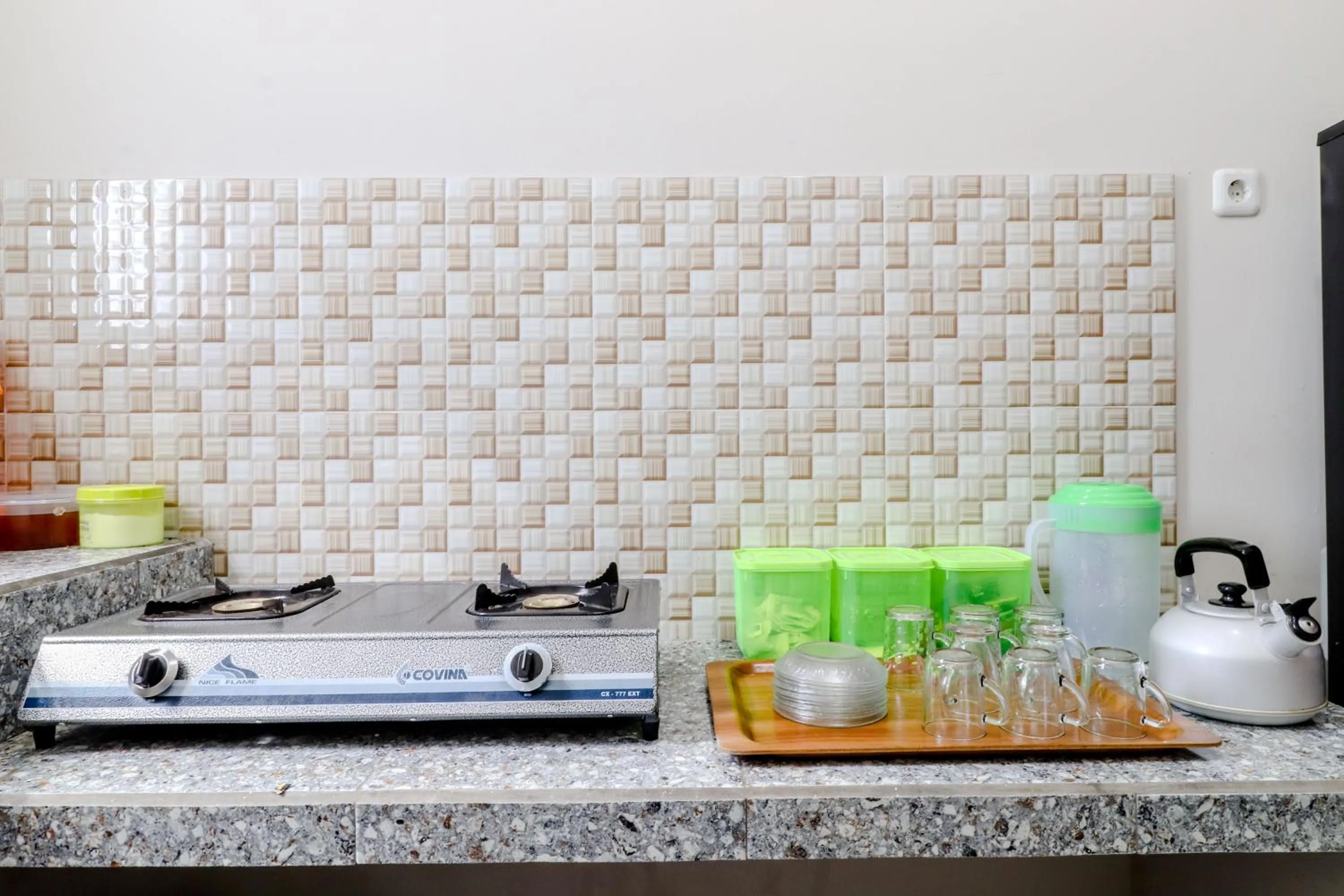 Kitchen or kitchenette in Guesthouse Nusa Indah Syariah 2