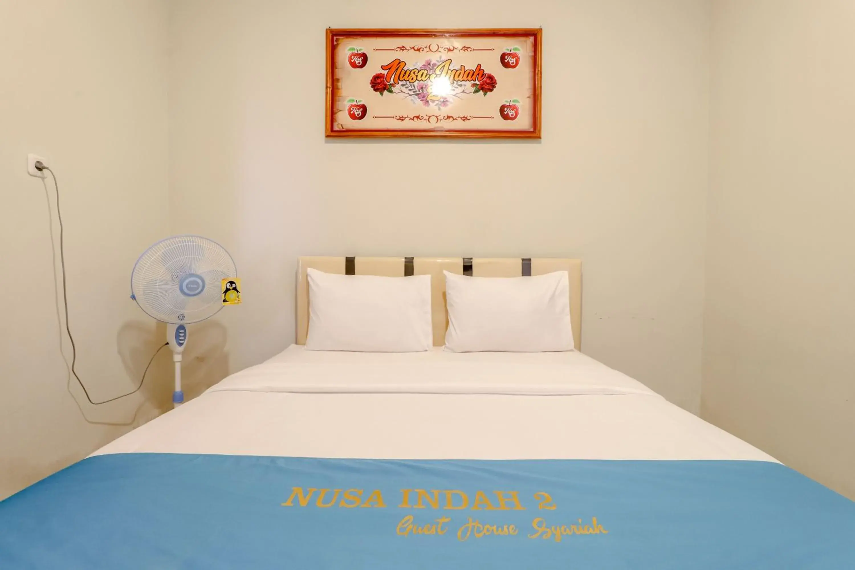 Bed in Guesthouse Nusa Indah Syariah 2 Bed in Guesthouse Nusa Indah Syariah 2