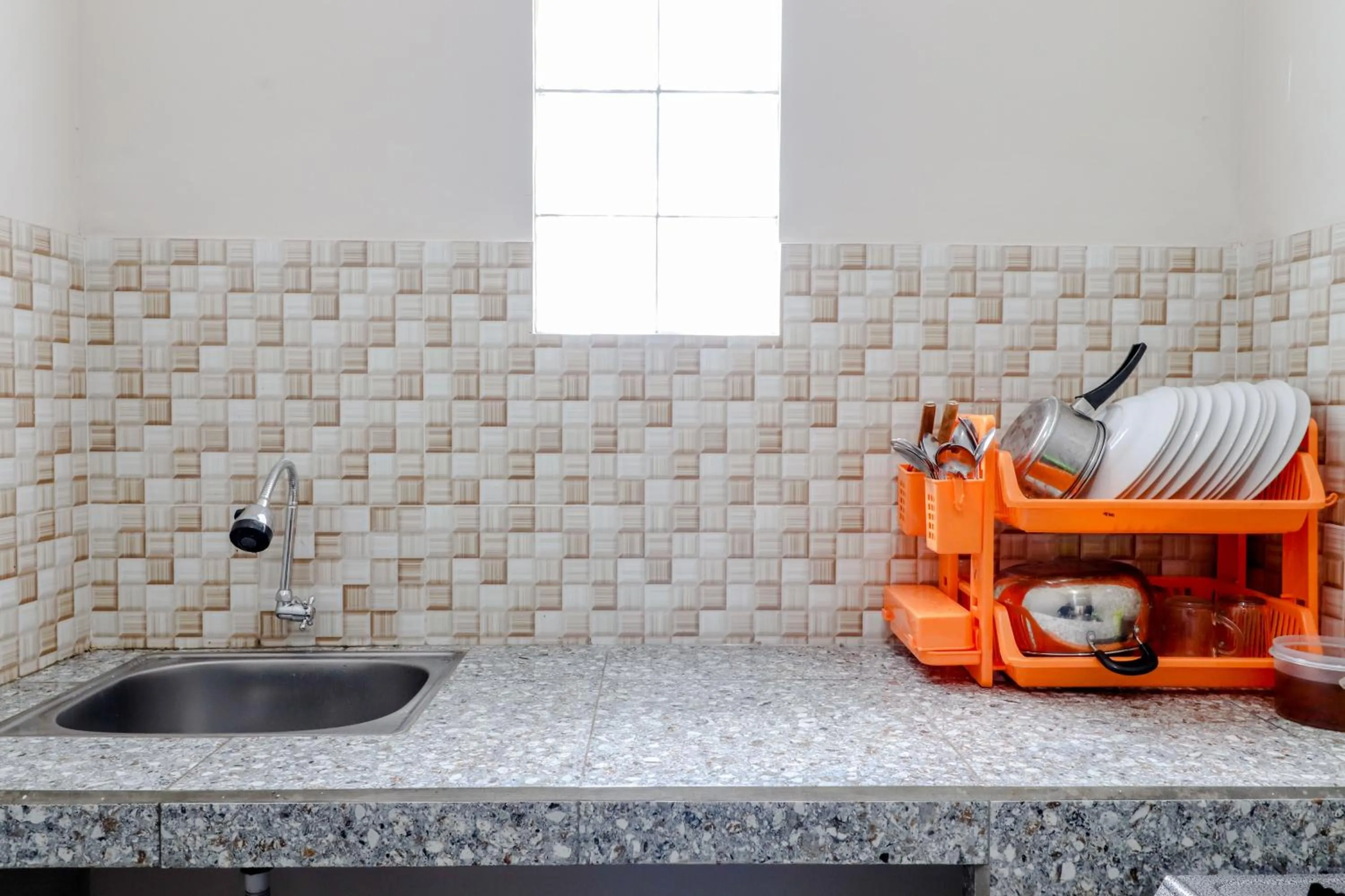 Kitchen or kitchenette in Guesthouse Nusa Indah Syariah 2