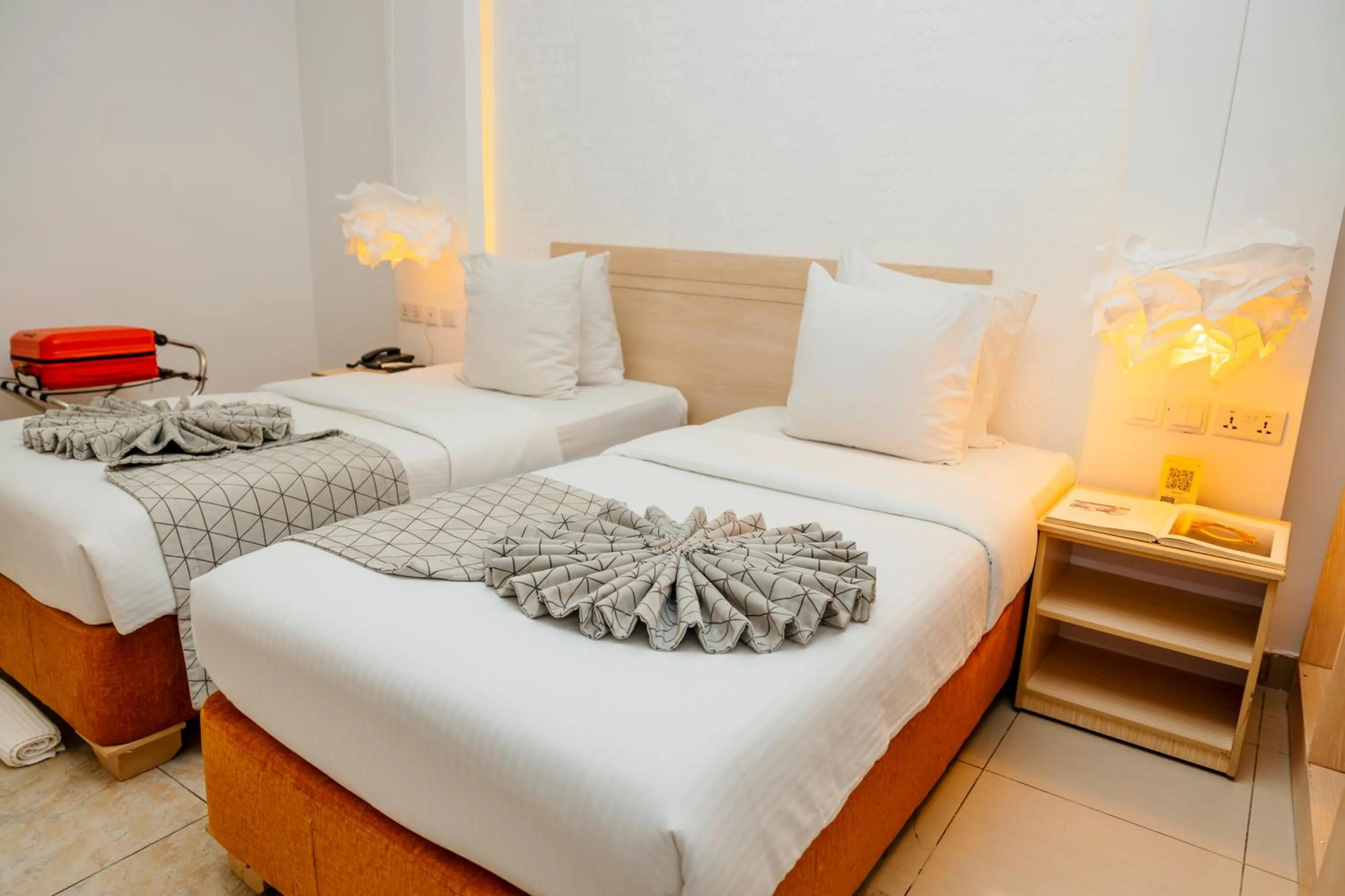 Bed in Amata n'Ubuki Boutique Hotel Ltd