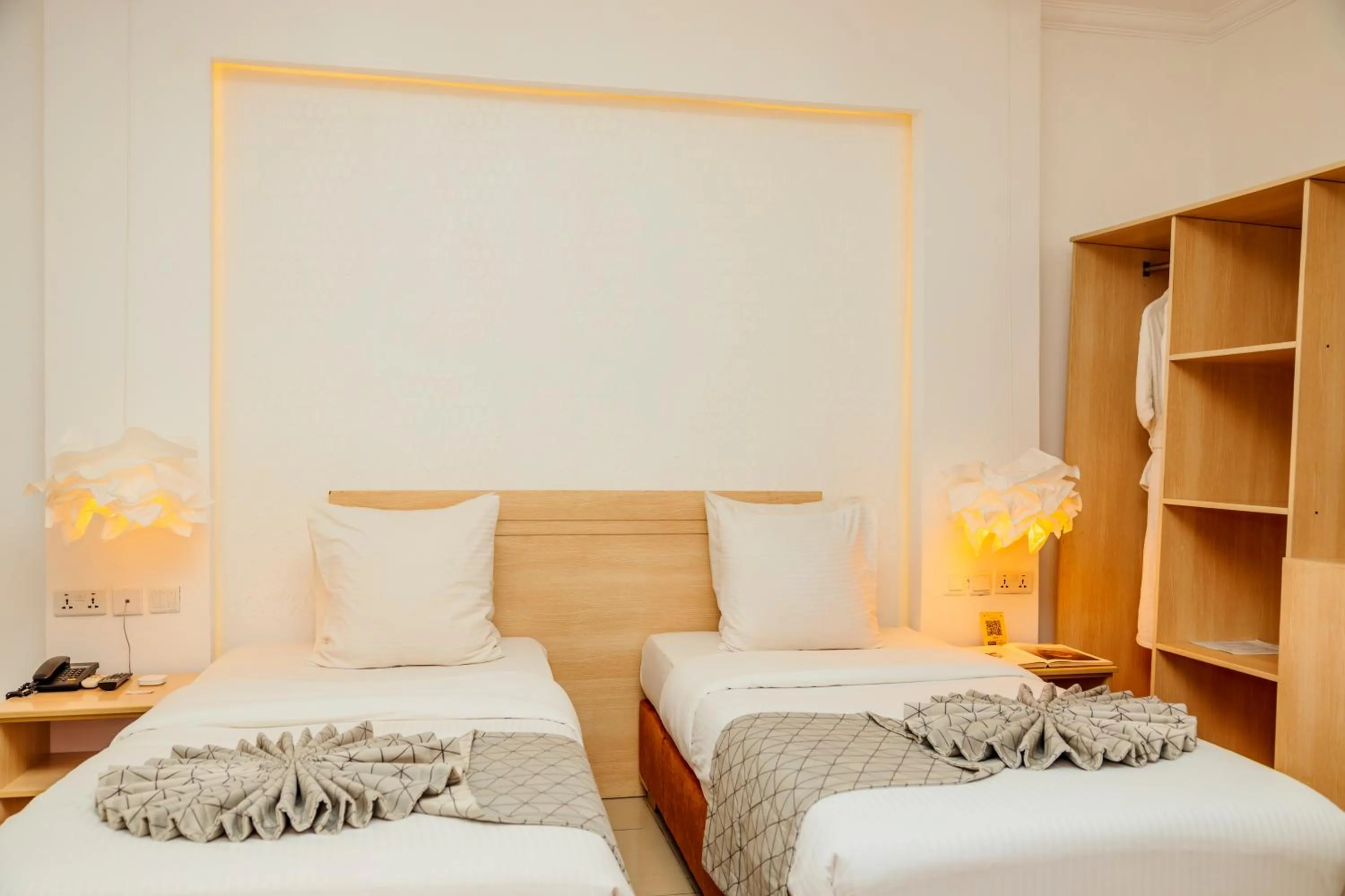 Bed in Amata n'Ubuki Boutique Hotel Ltd