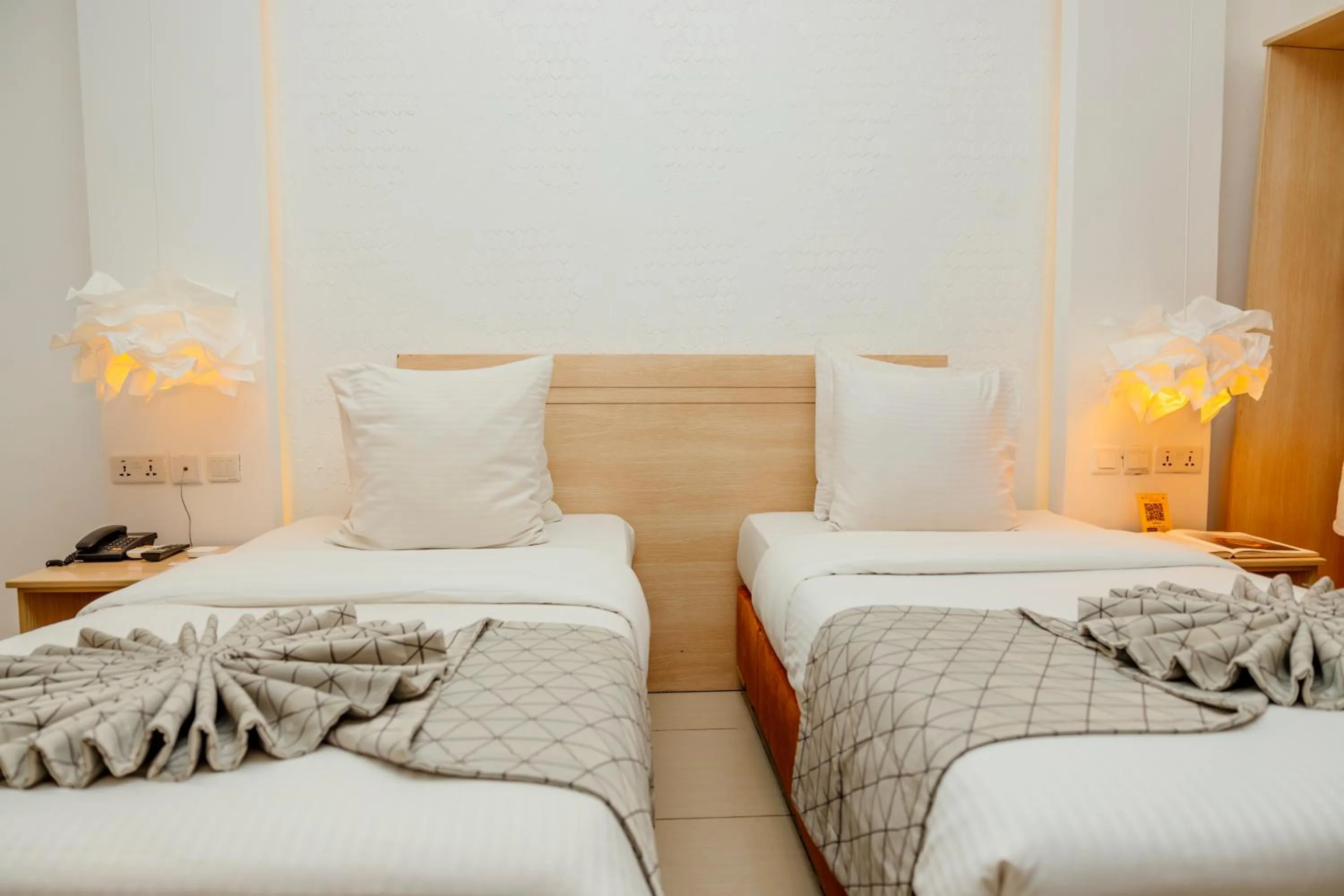 Bed in Amata n'Ubuki Boutique Hotel Ltd