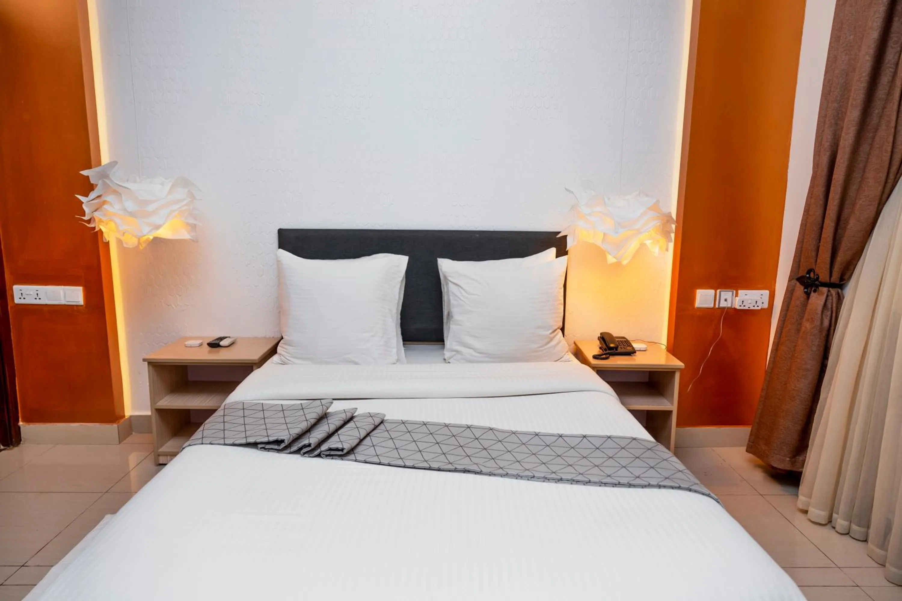 Bed in Amata n'Ubuki Boutique Hotel Ltd