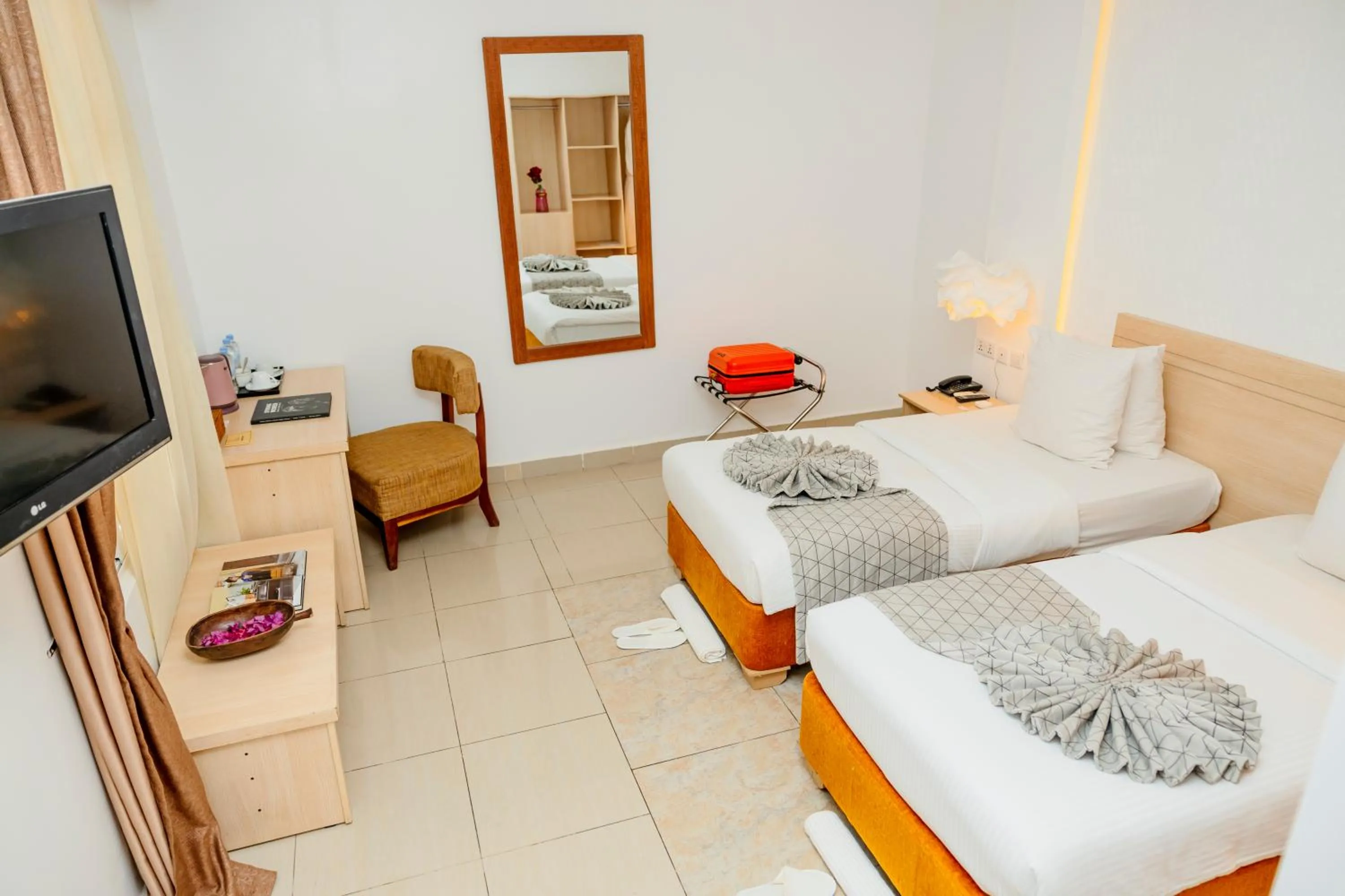 Bed in Amata n'Ubuki Boutique Hotel Ltd