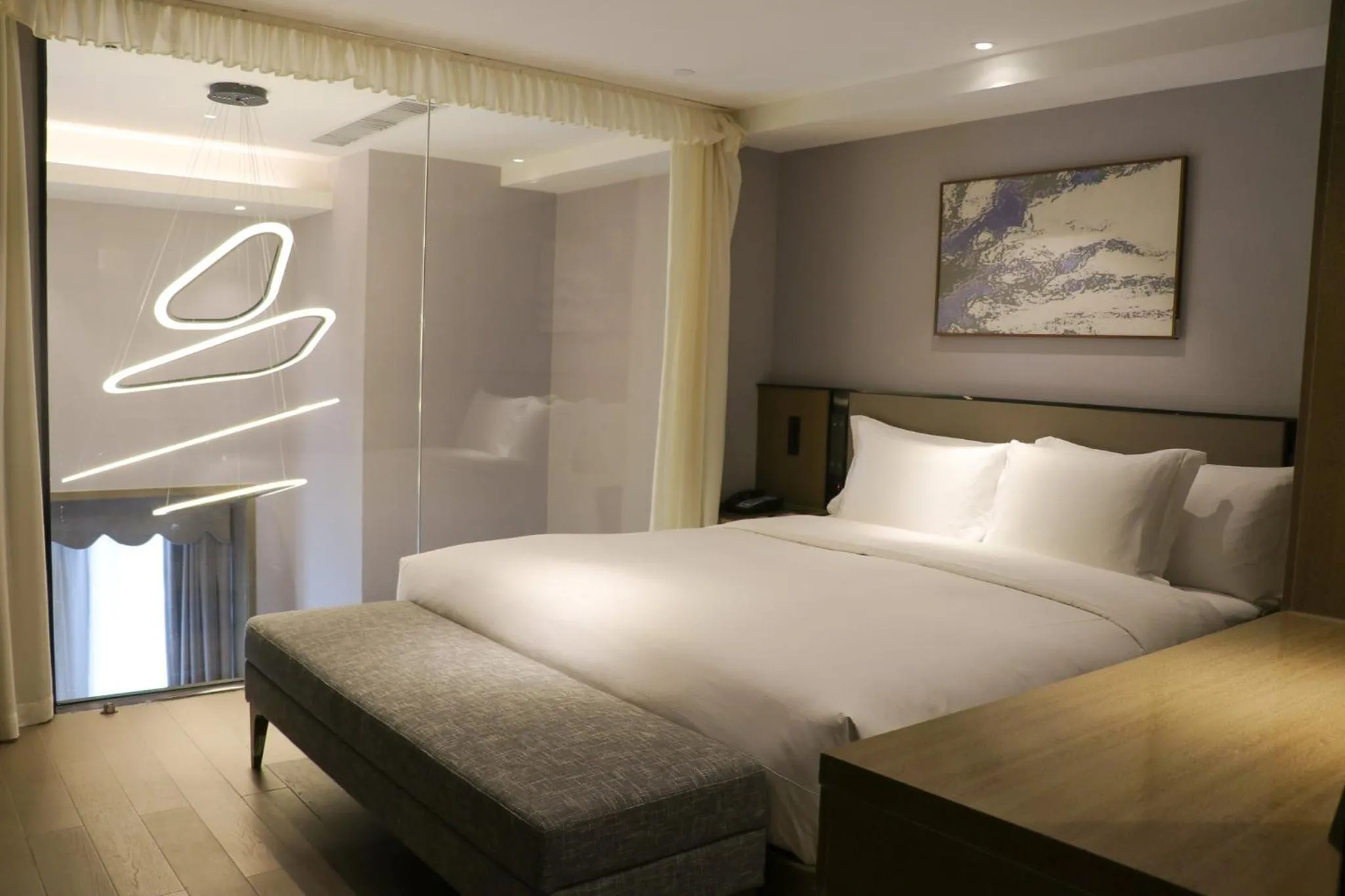 Photo of the whole room, Bed in Crowne Plaza Wuhan Development Zone by IHG