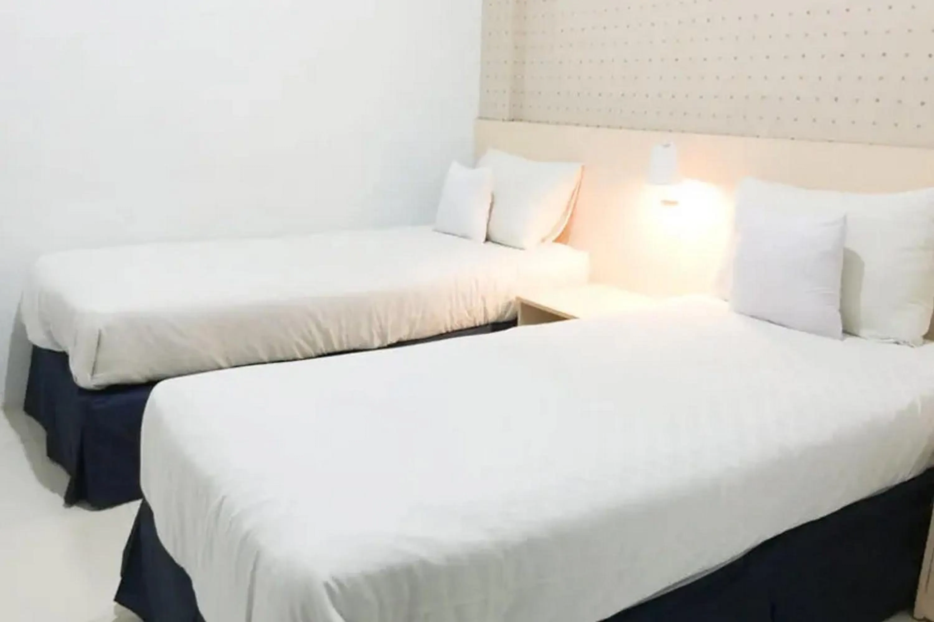 Bed in Rumah Teuku Umar Mitra RedDoorz