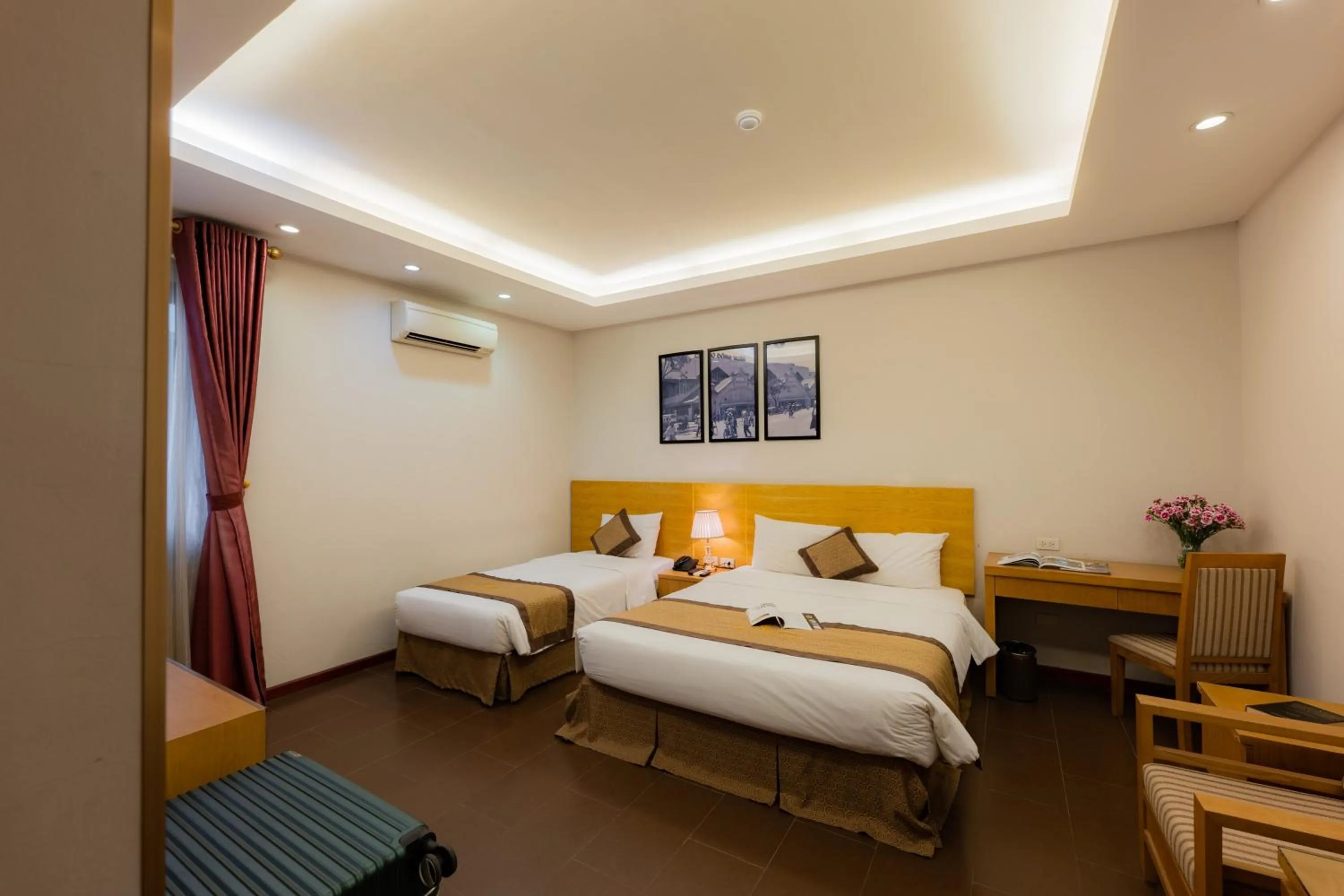 Bed in Riverside Hanoi Hotel