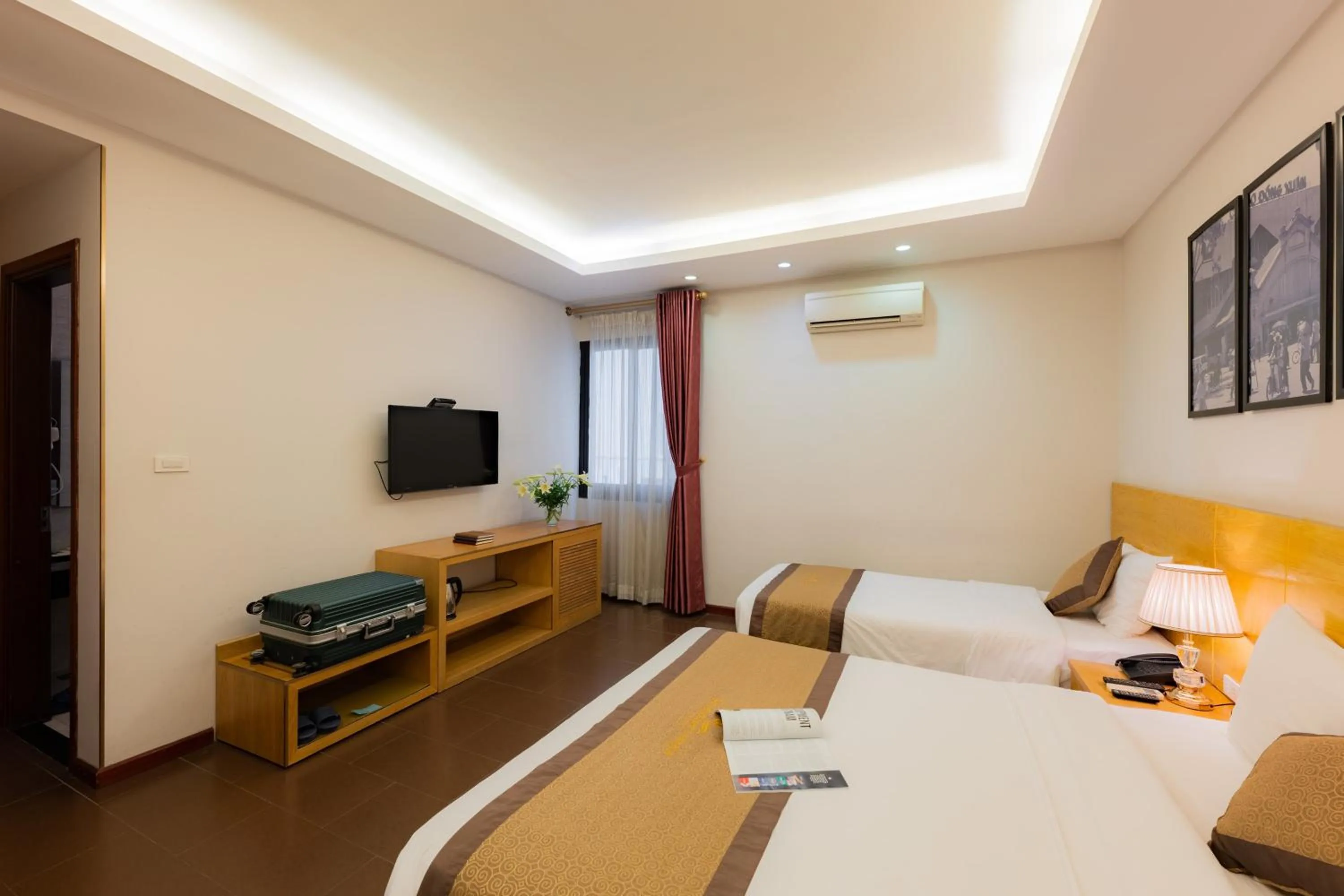 Bed in Riverside Hanoi Hotel