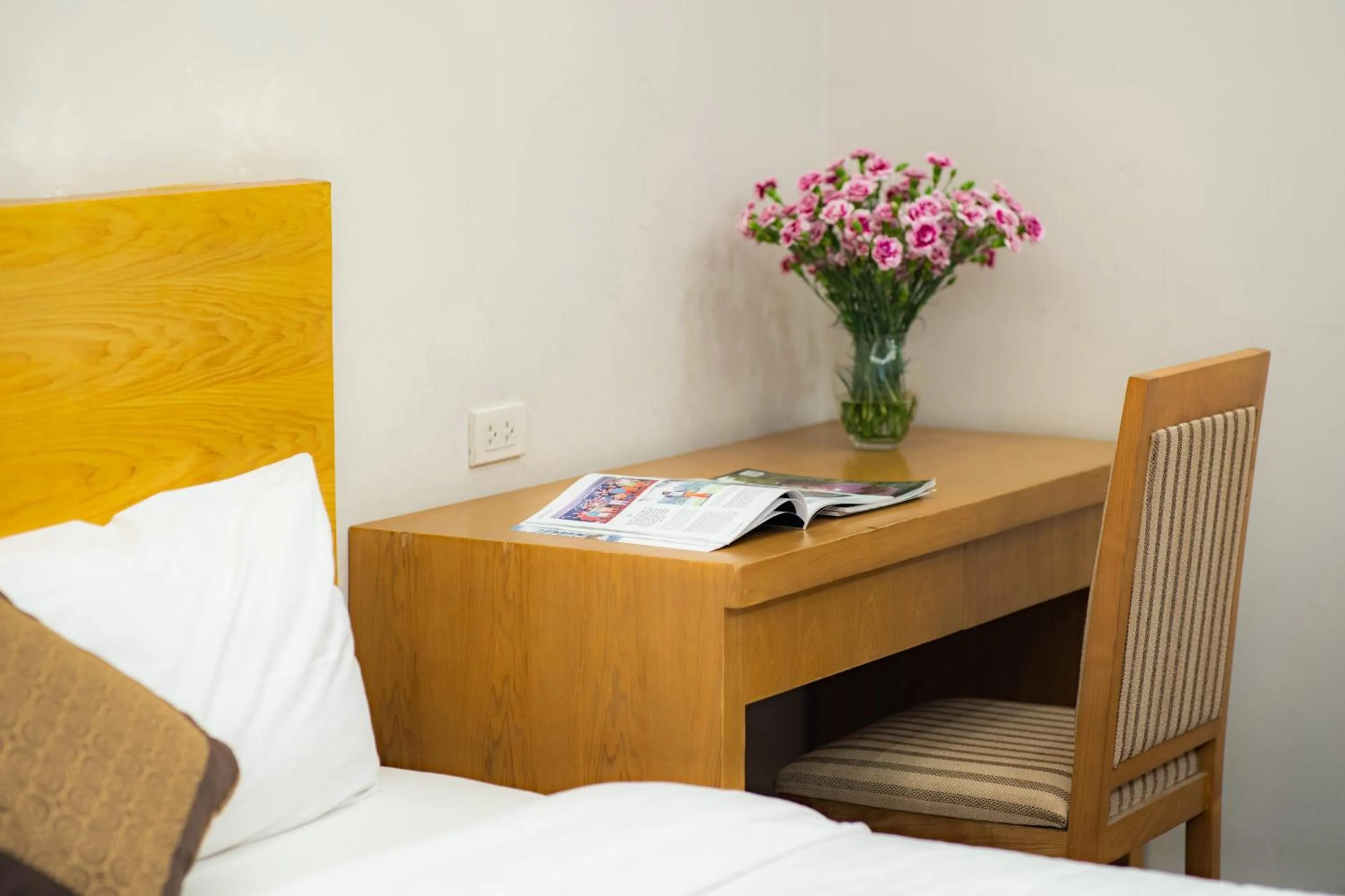 Bed in Riverside Hanoi Hotel