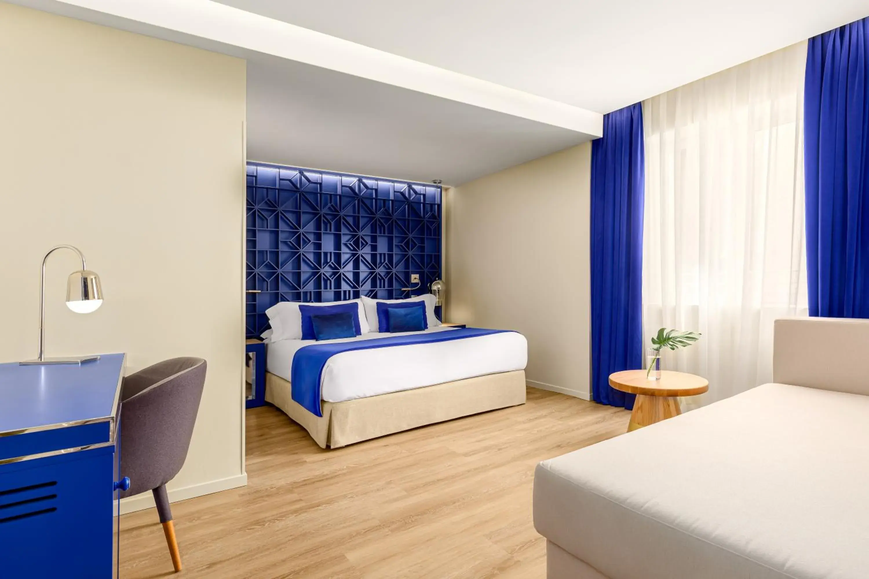 Bed in Room Mate Macarena, Madrid Gran Vía Bed in Room Mate Macarena, Madrid Gran Vía