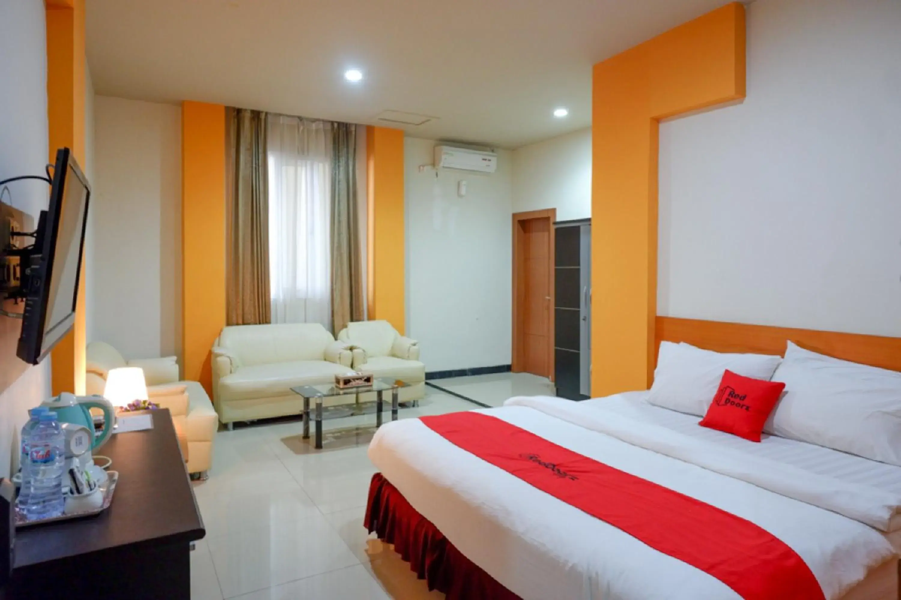 Photo of the whole room, Bed in RedDoorz Plus @ Cameloan Hotel Palu Photo of the whole room, Bed in RedDoorz Plus @ Cameloan Hotel Palu