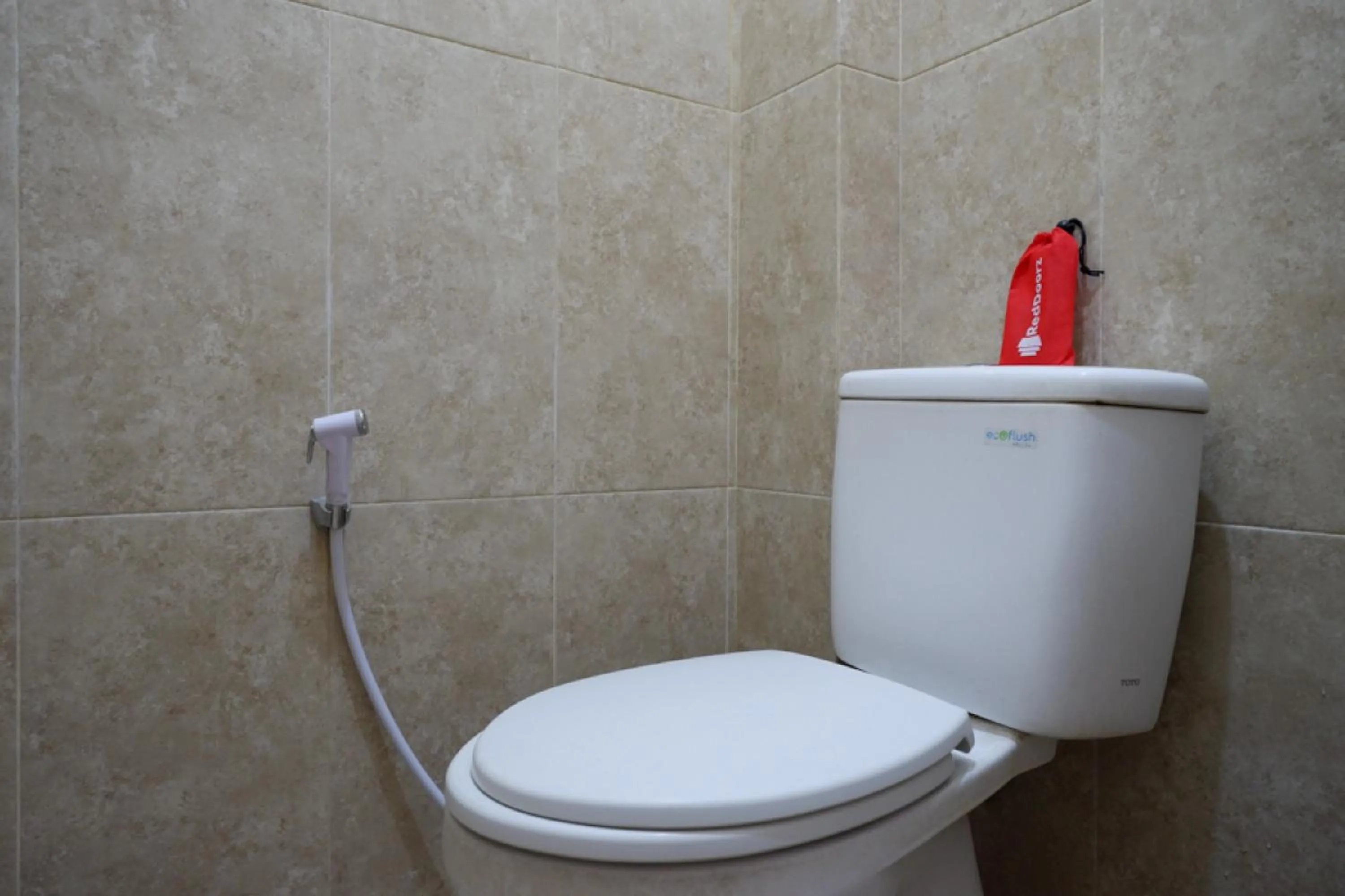 Bathroom in RedDoorz near Millenium Waterpark Palu