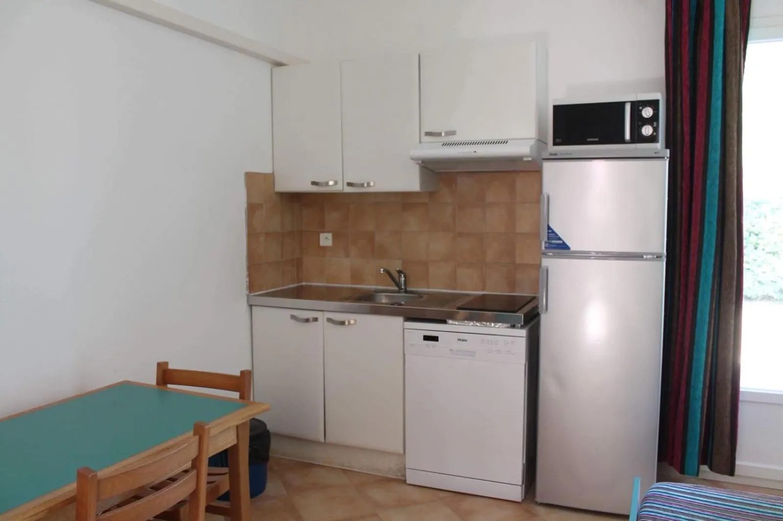 Kitchen or kitchenette in Résidence Cala Bianca