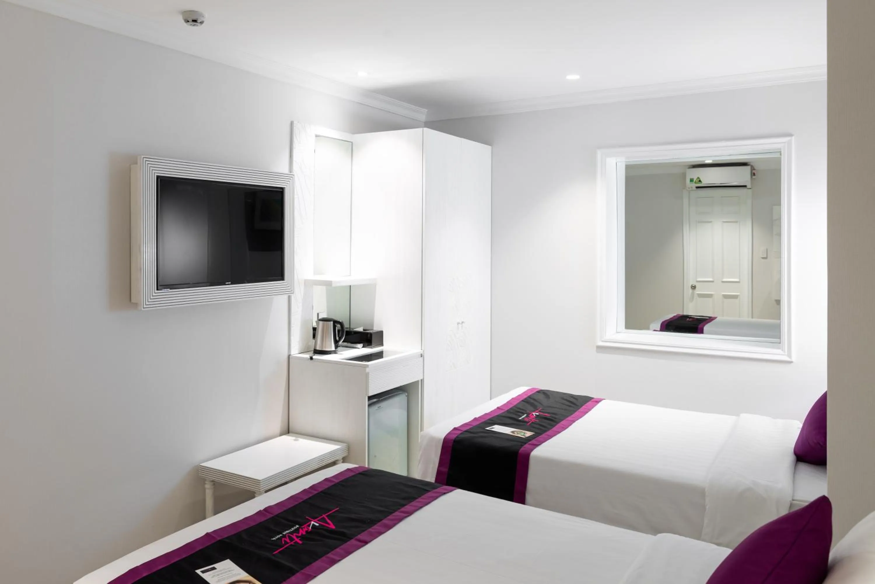 Bed in Avanti Boutique Hotel