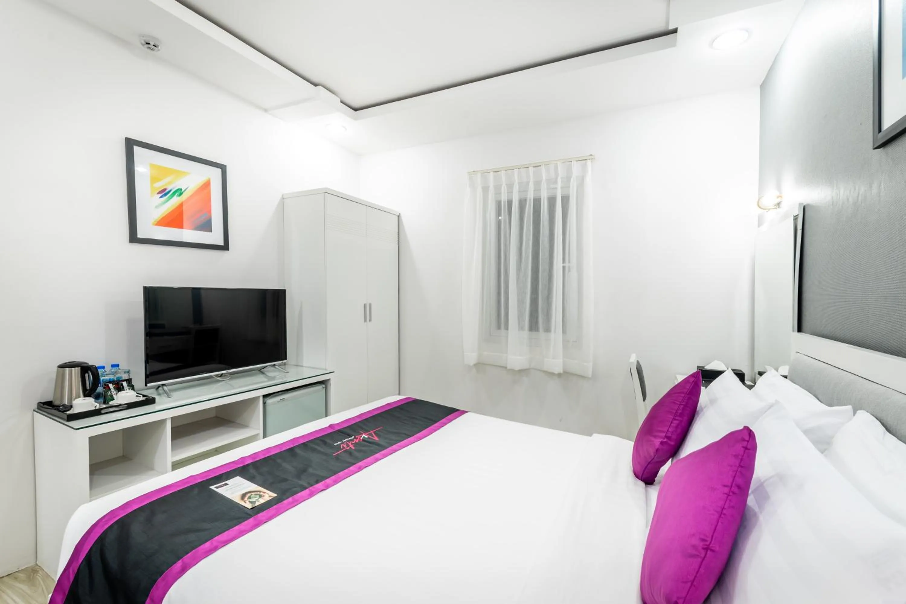 Bed in Avanti Boutique Hotel