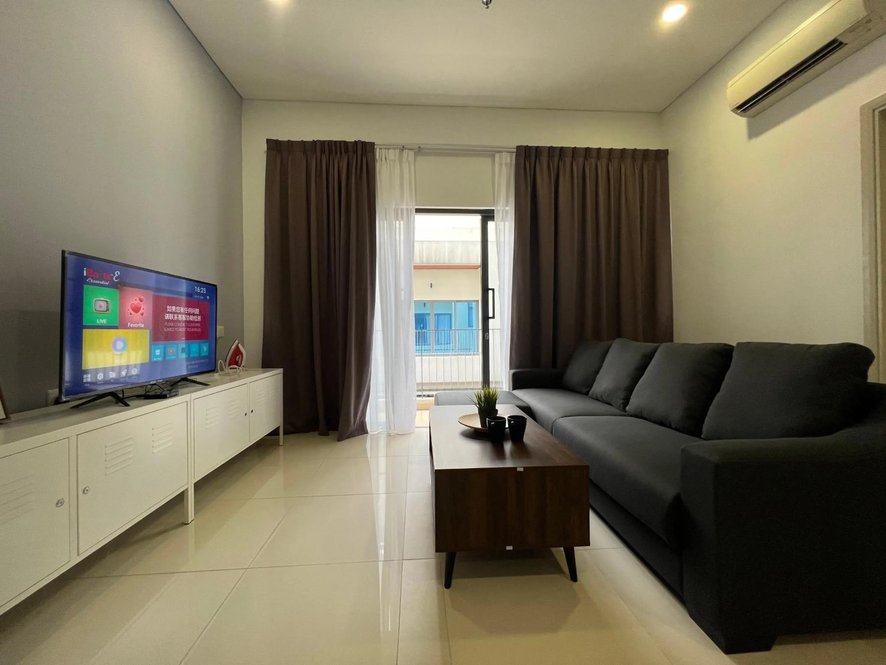 Communal lounge/ TV room in Plaza Arkadia Desa Parkcity by KLhomesweet