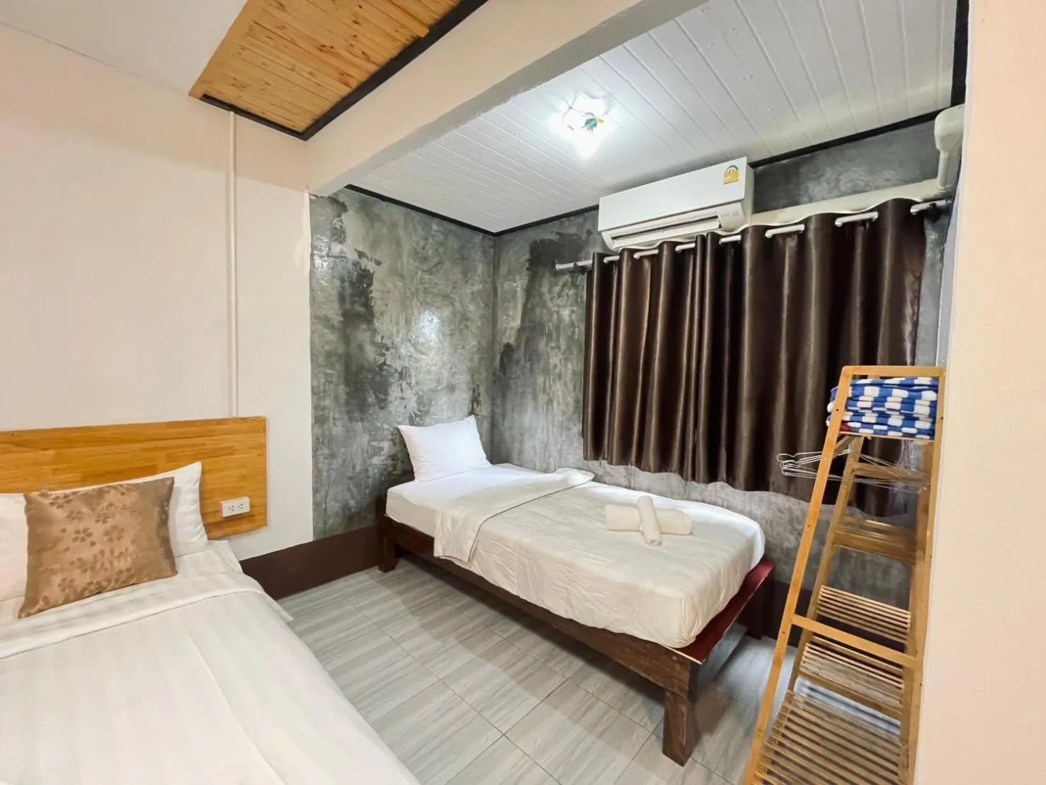 Bed in Mookboonchu Guesthouse ,Kohmook Trang