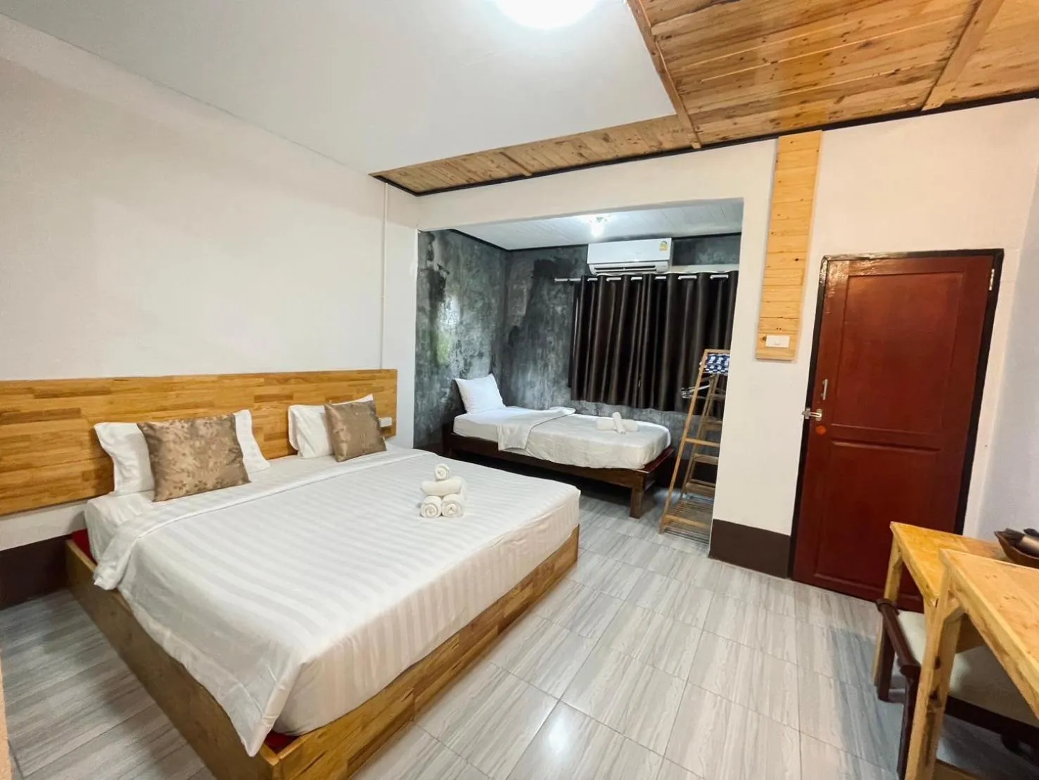 Photo of the whole room, Bed in Mookboonchu Guesthouse ,Kohmook Trang