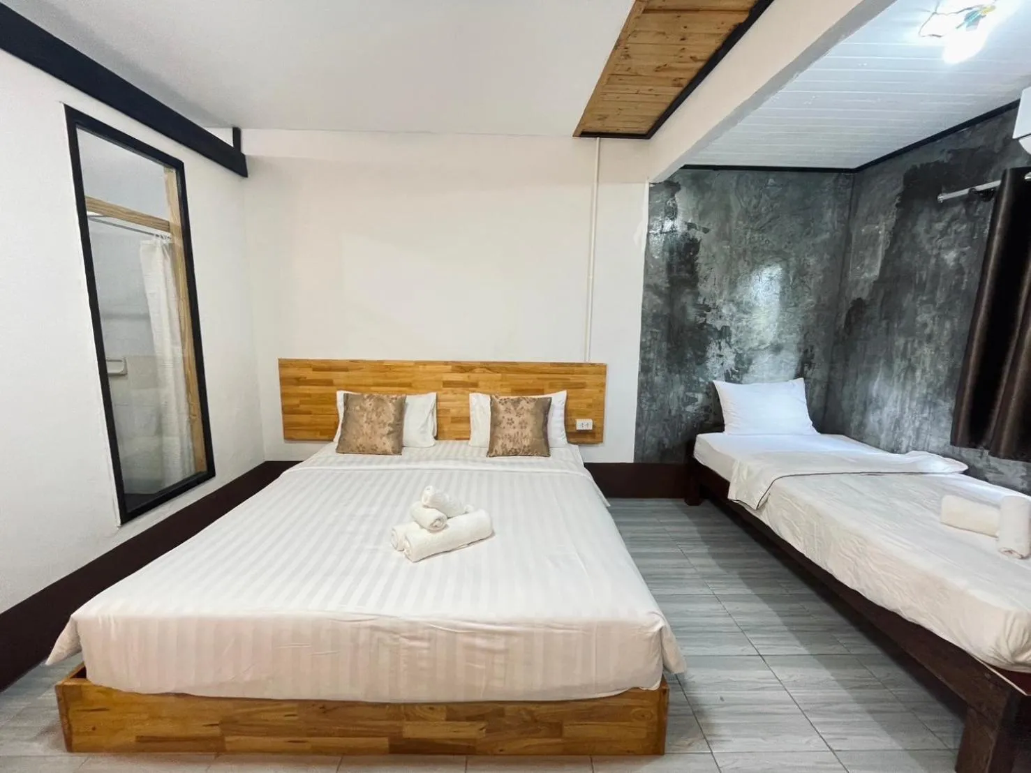 Bed in Mookboonchu Guesthouse ,Kohmook Trang