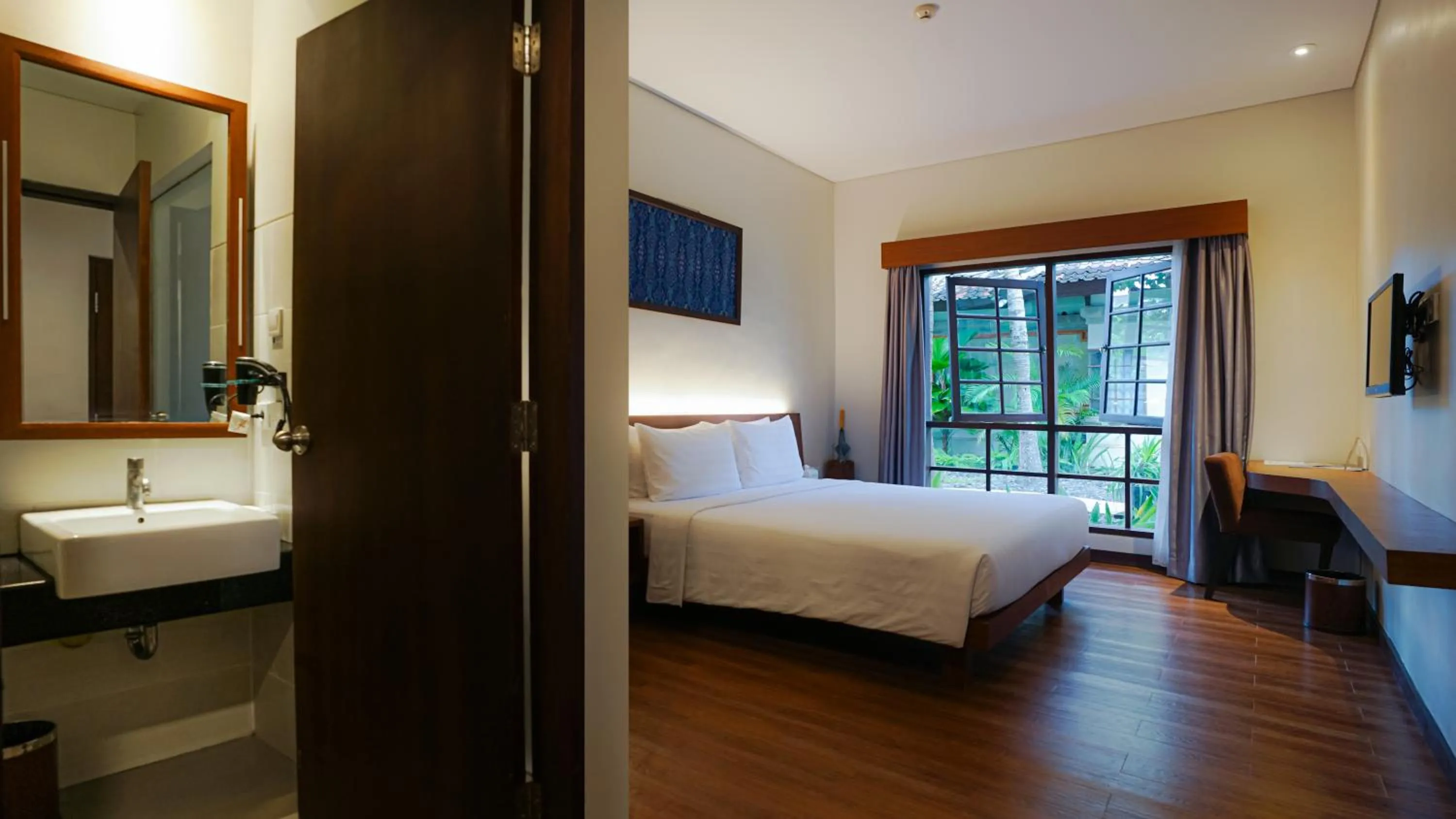 Bed in Grand Whiz Hotel Nusa Dua Bali