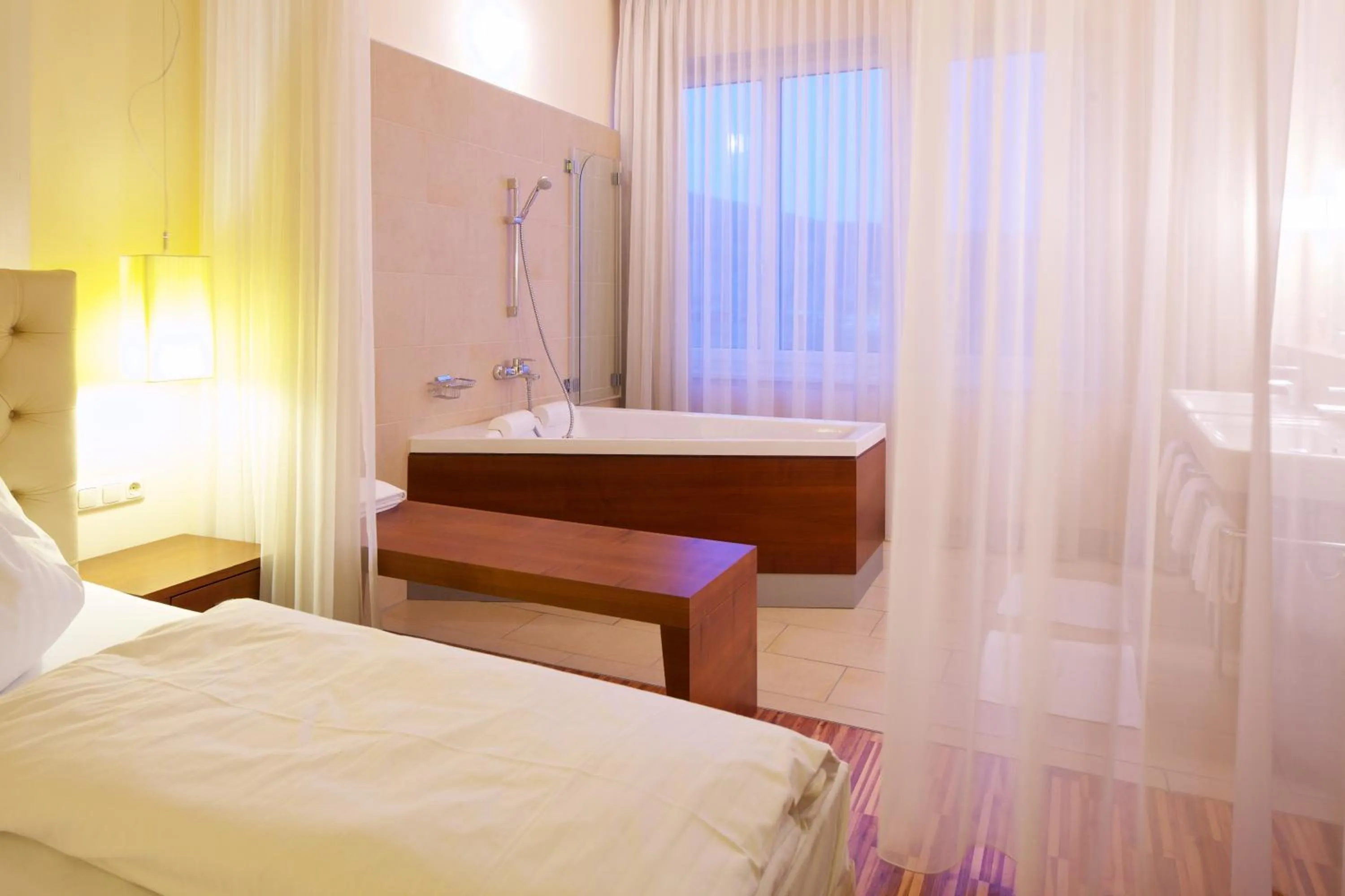 Bathroom, Bed in Hotel-Restaurant Allmer