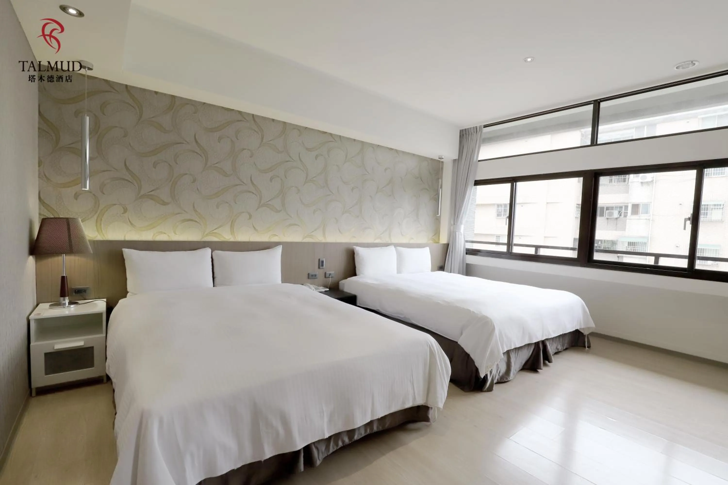 Photo of the whole room, Bed in Talmud Hotel Taichung
