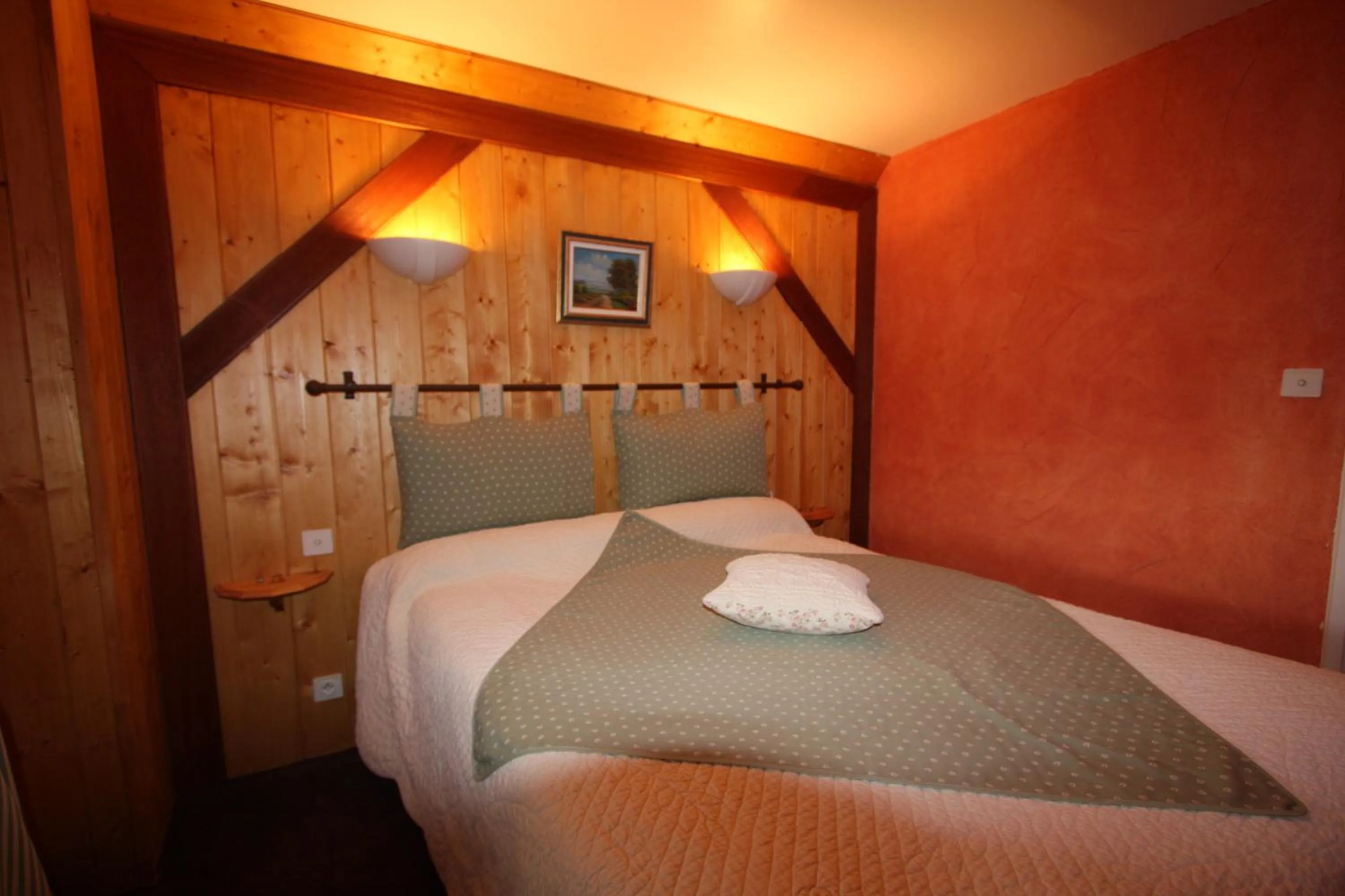 Bed in Hotel Le Rocher Blanc