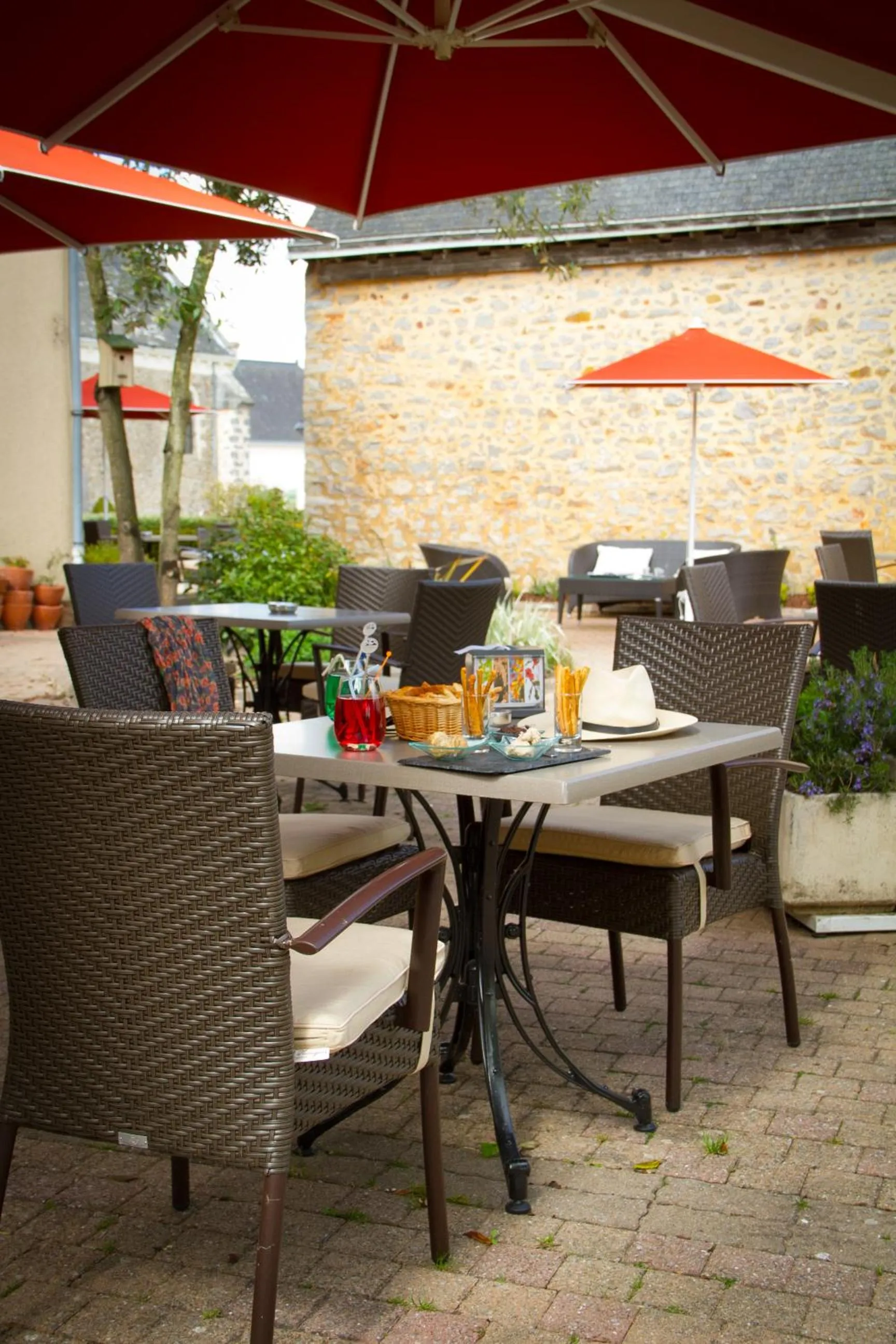 Balcony/Terrace in Logis L'Ermitage Hôtel & Restaurant