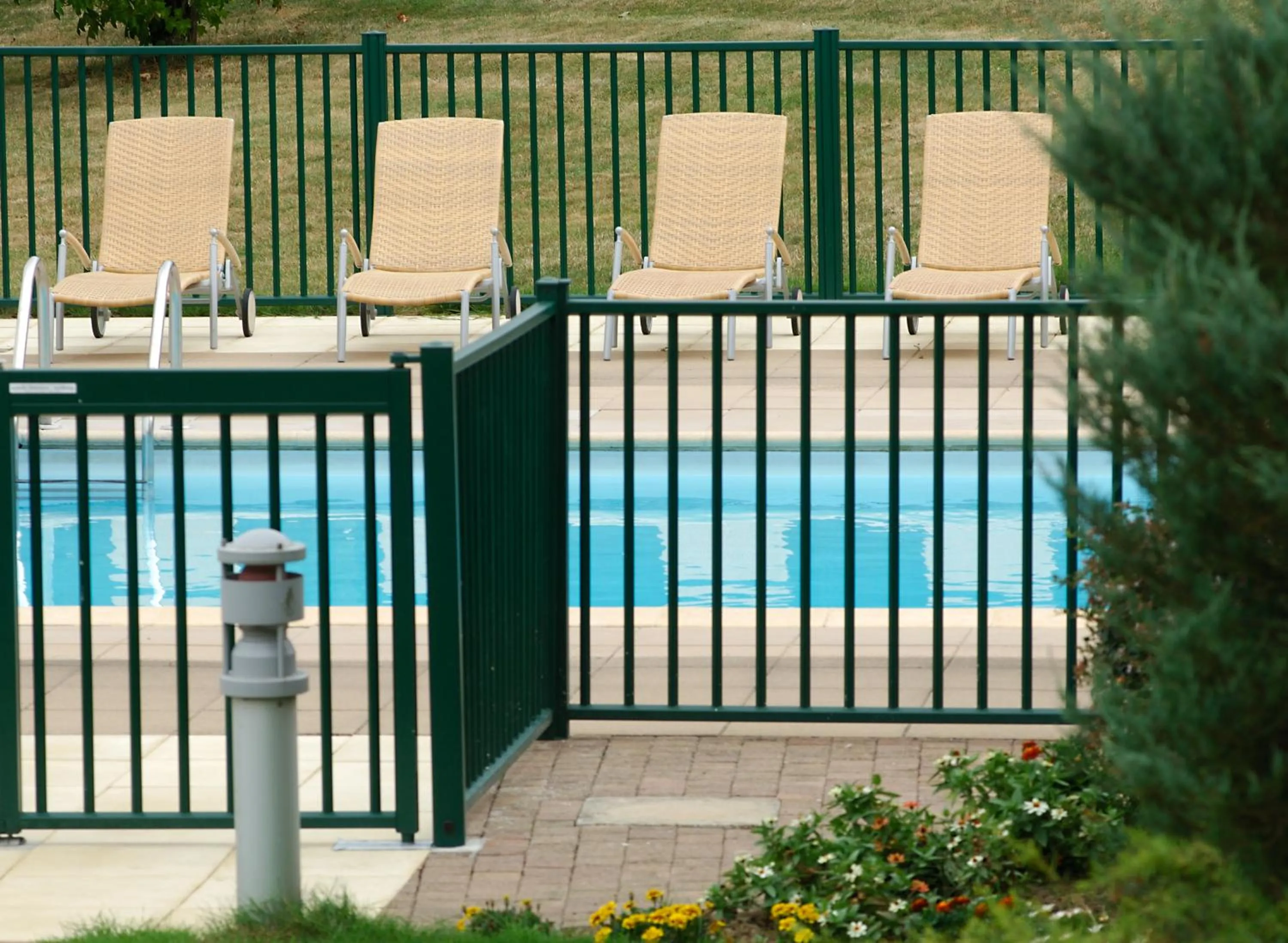 Swimming pool in Logis L'Ermitage Hôtel & Restaurant