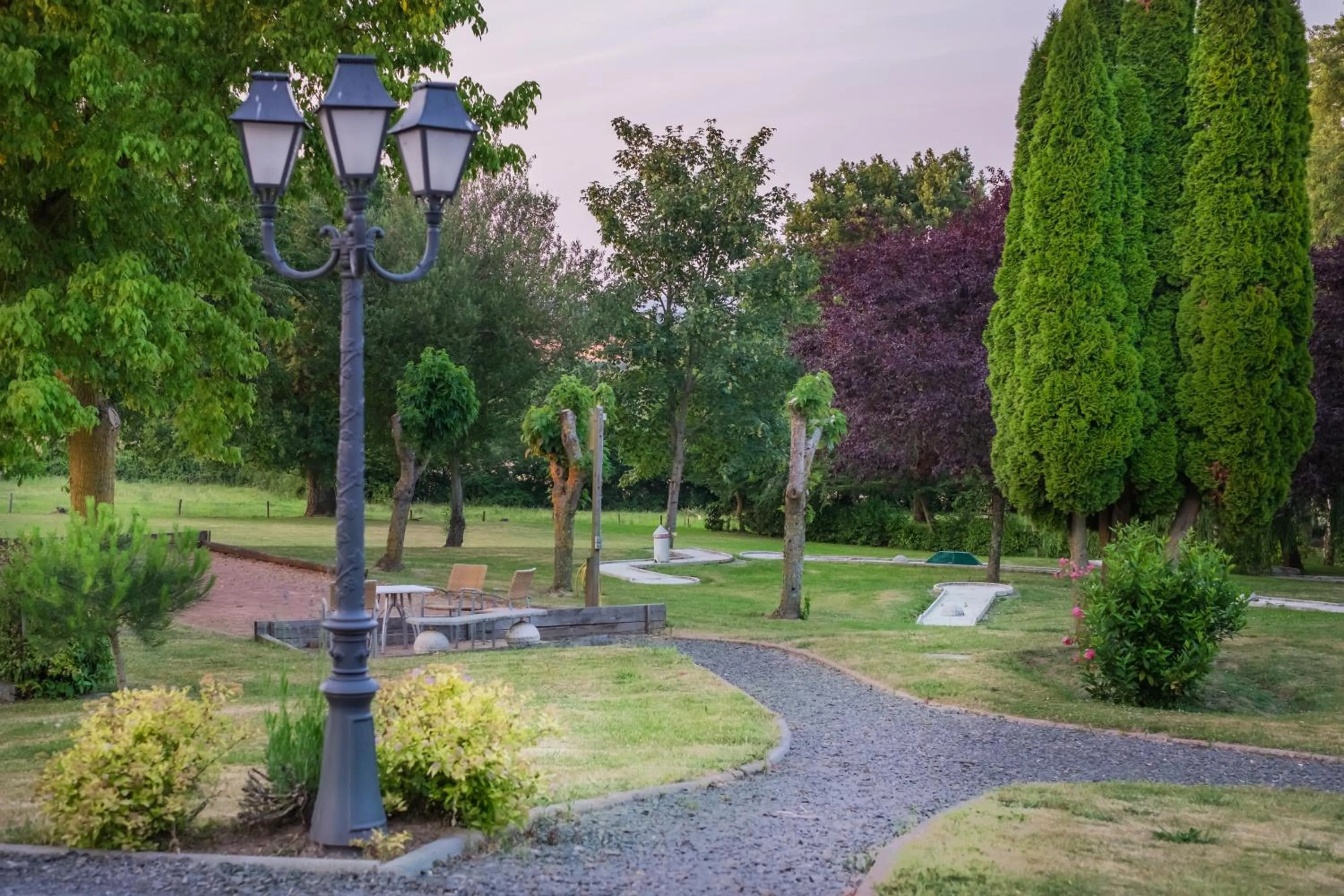 Garden view in Logis L'Ermitage Hôtel & Restaurant