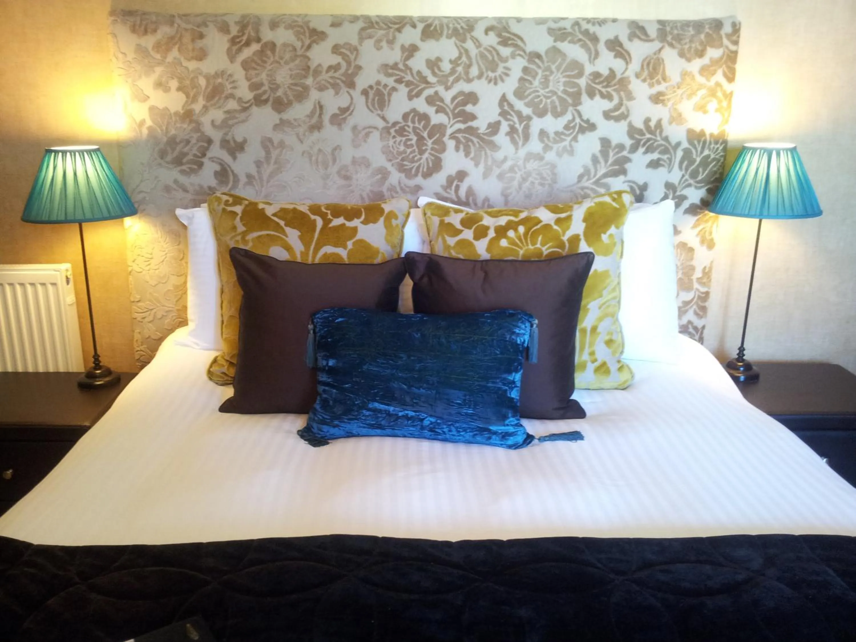 Bed in The Ambassador Townhouse