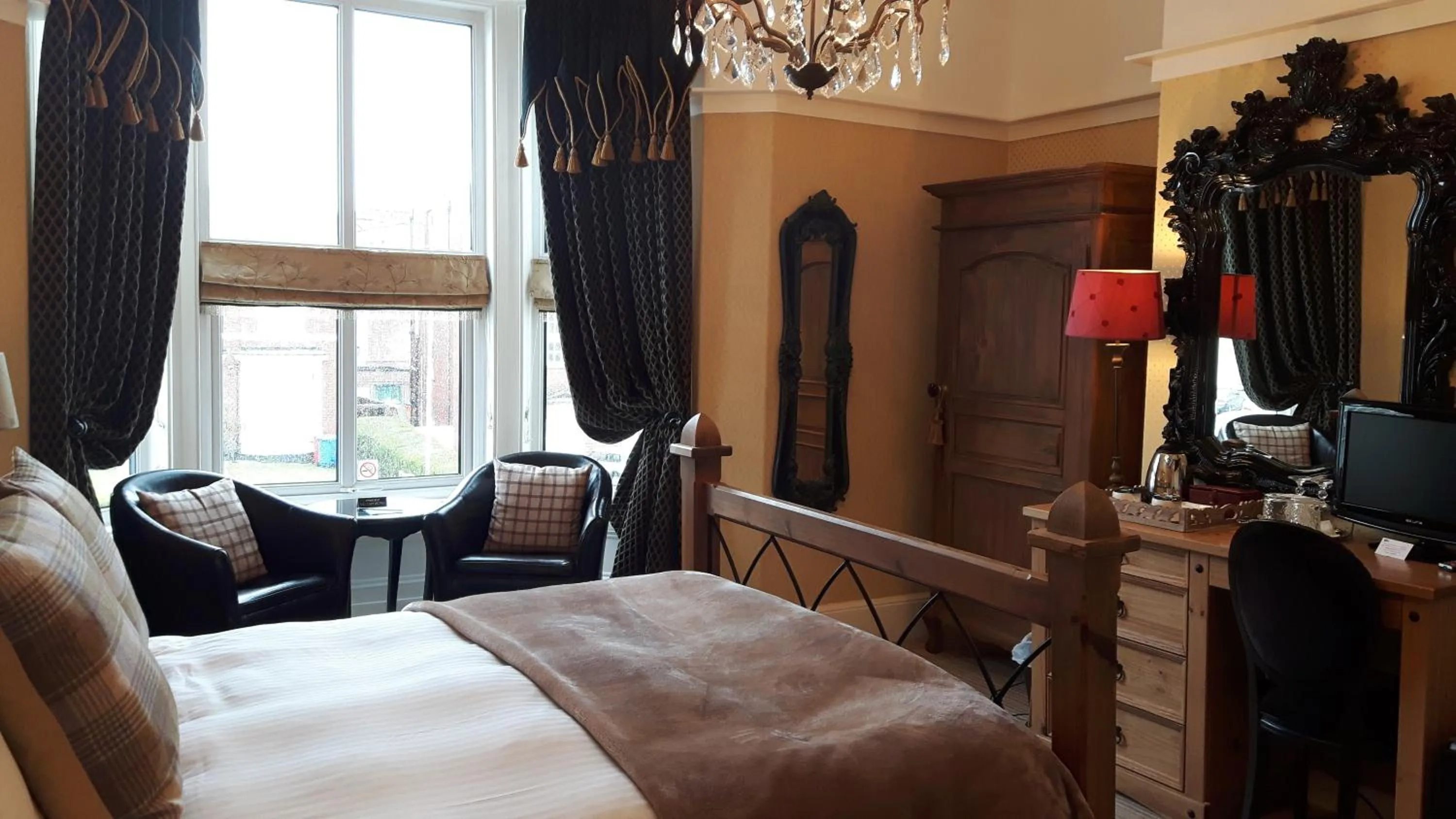 Bed in The Ambassador Townhouse