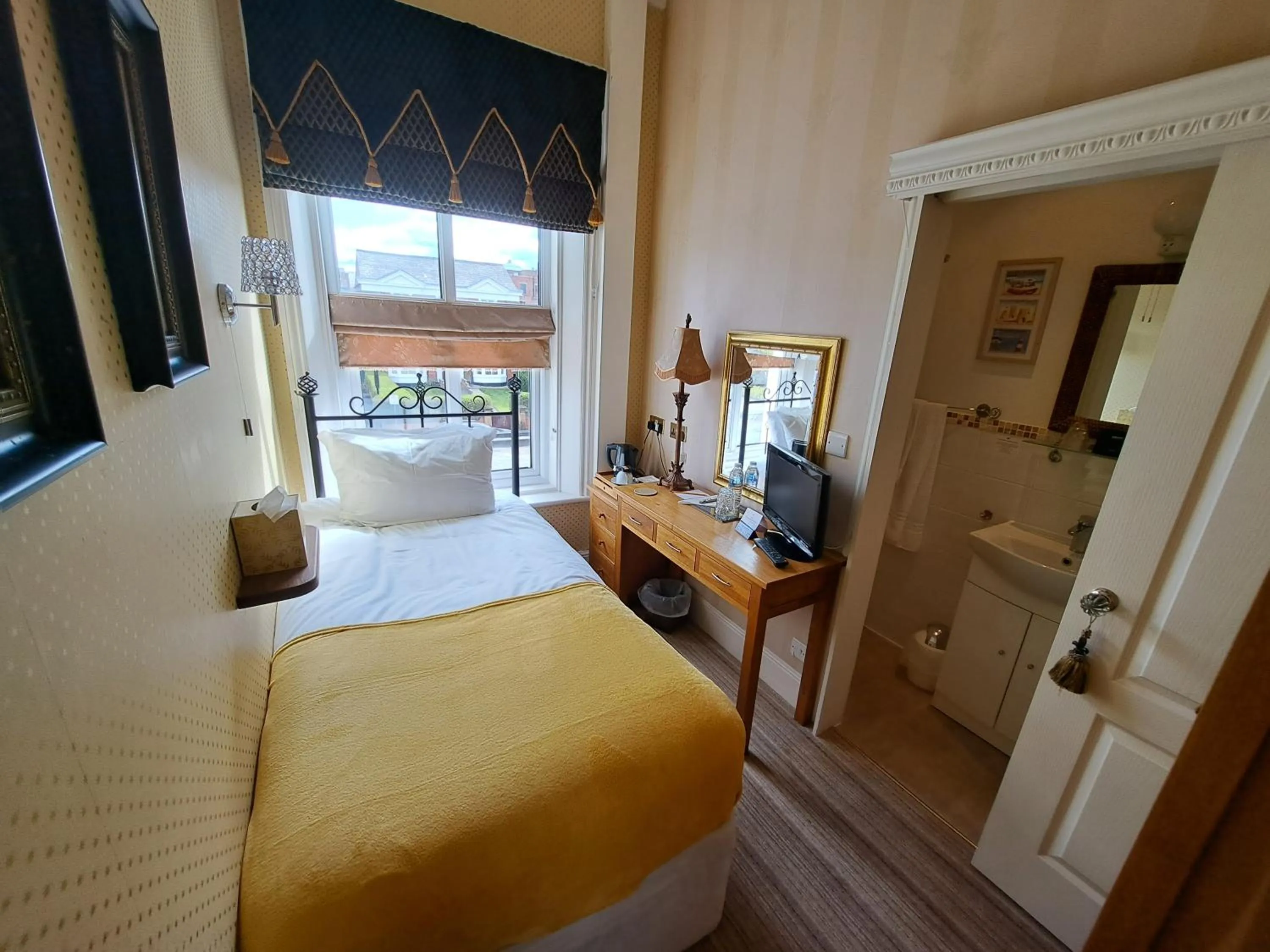 Bed in The Ambassador Townhouse