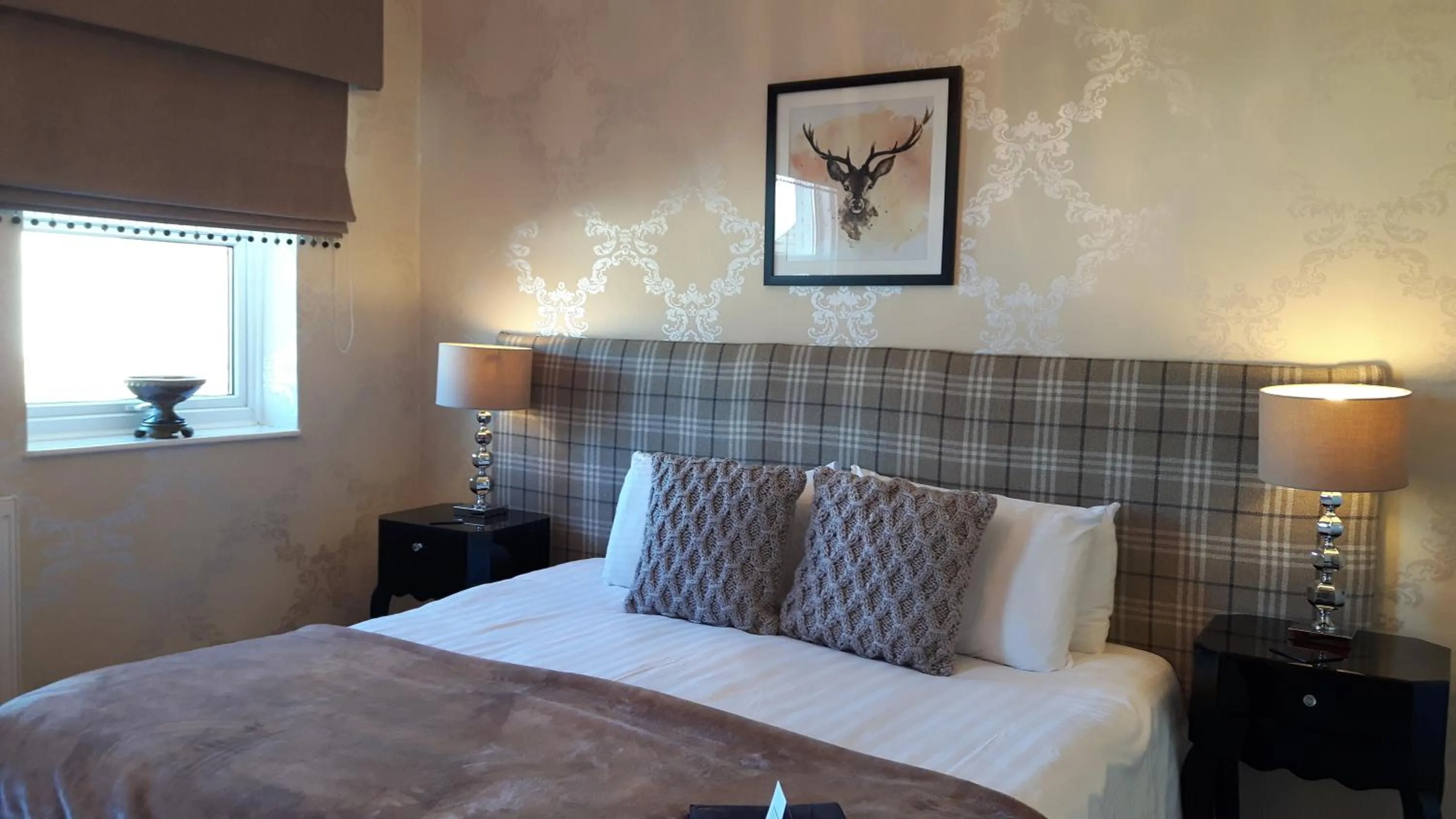 Bed in The Ambassador Townhouse