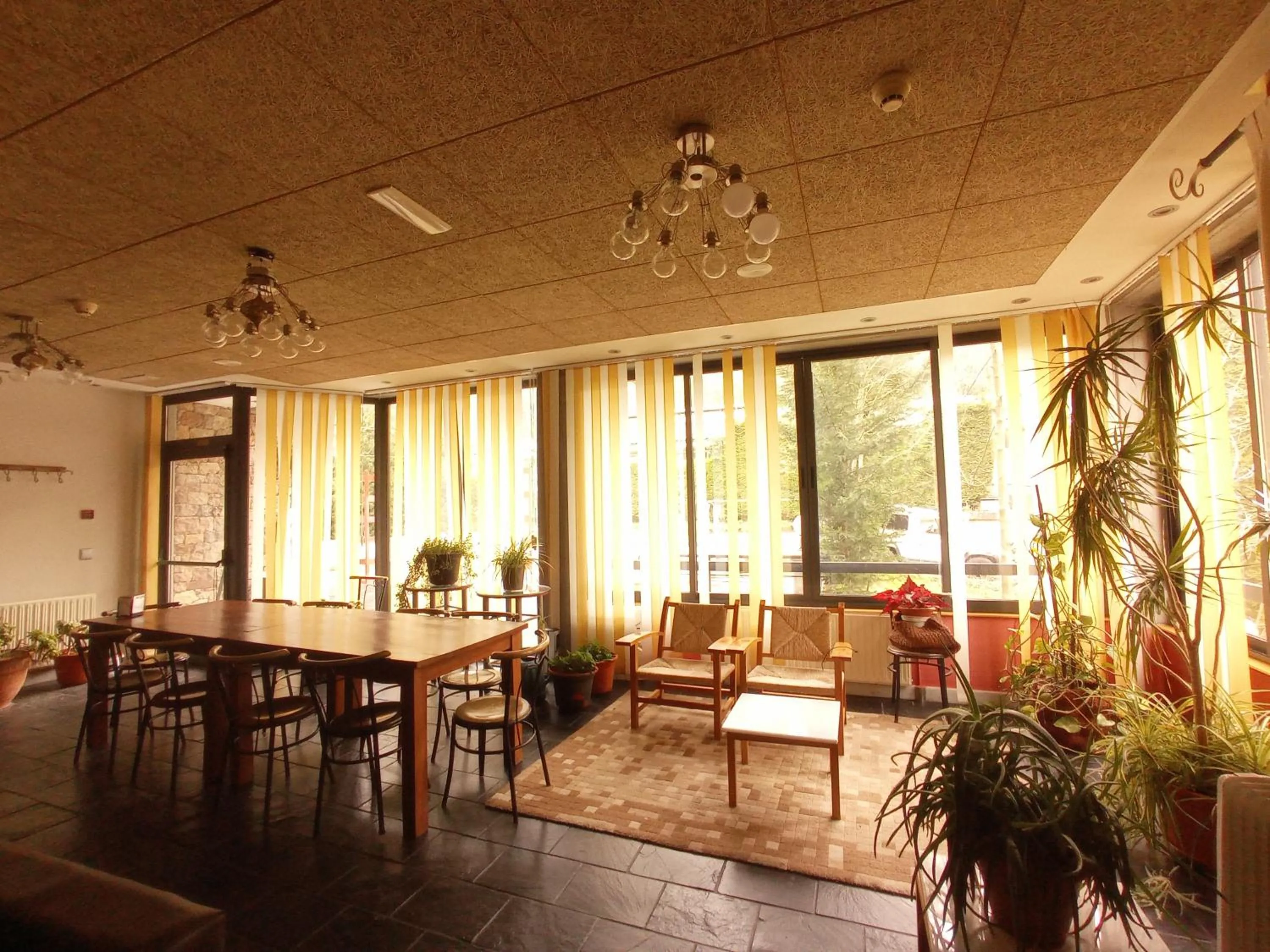 Communal lounge/ TV room in Hotel Castillo del Alba