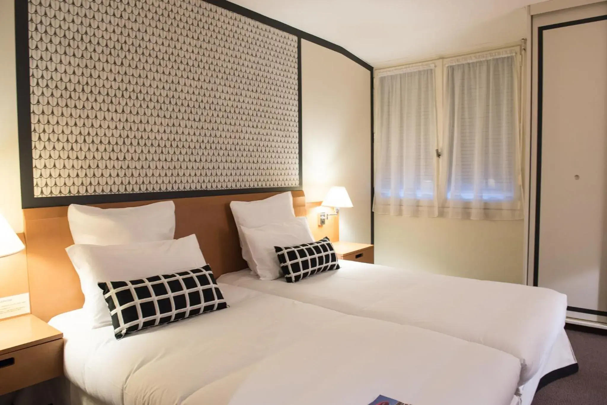 Twin Room in Hotel de Jouvence Twin Room in Hotel de Jouvence