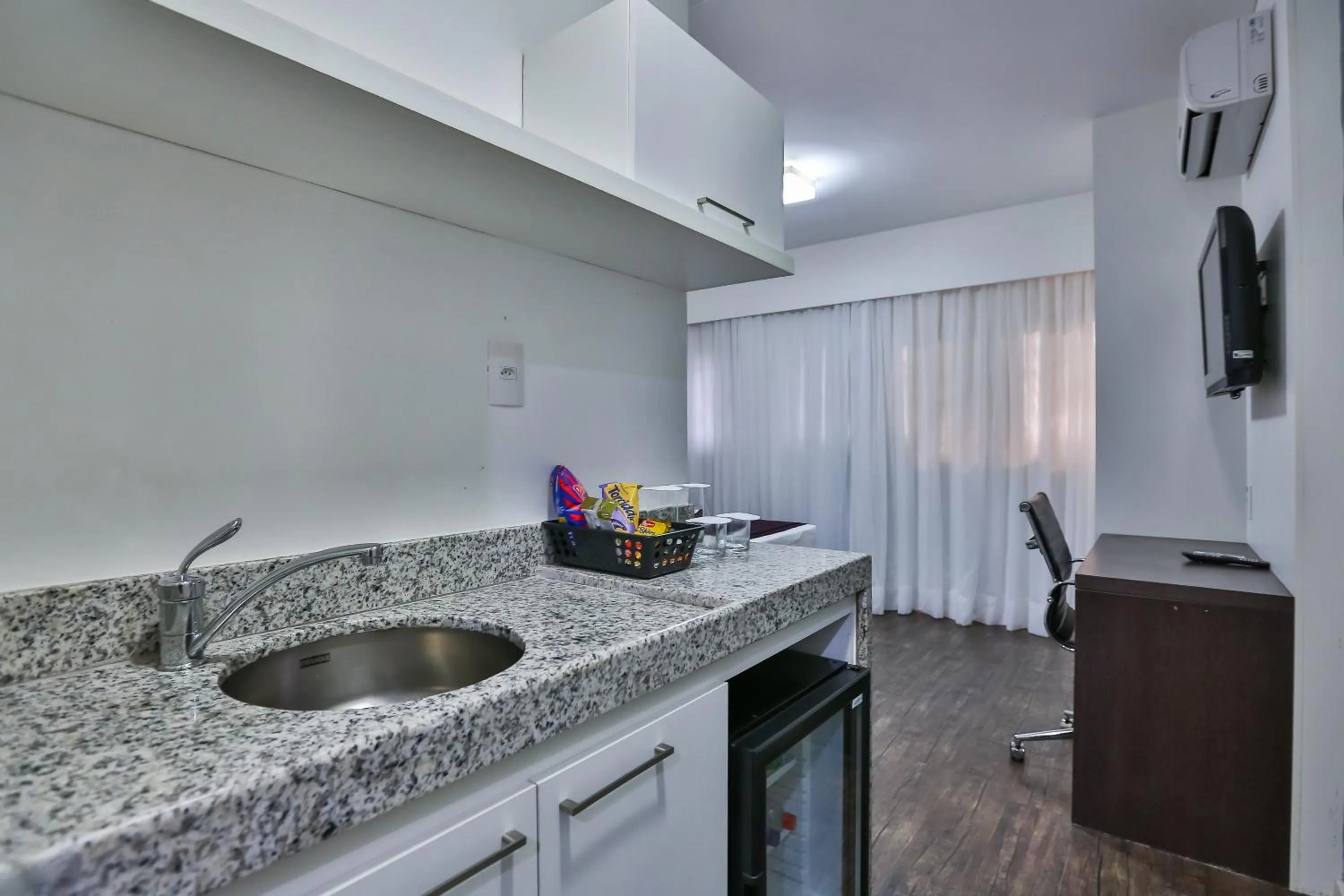 Kitchen or kitchenette in San Diego Suites Pampulha Hotel - Oficial