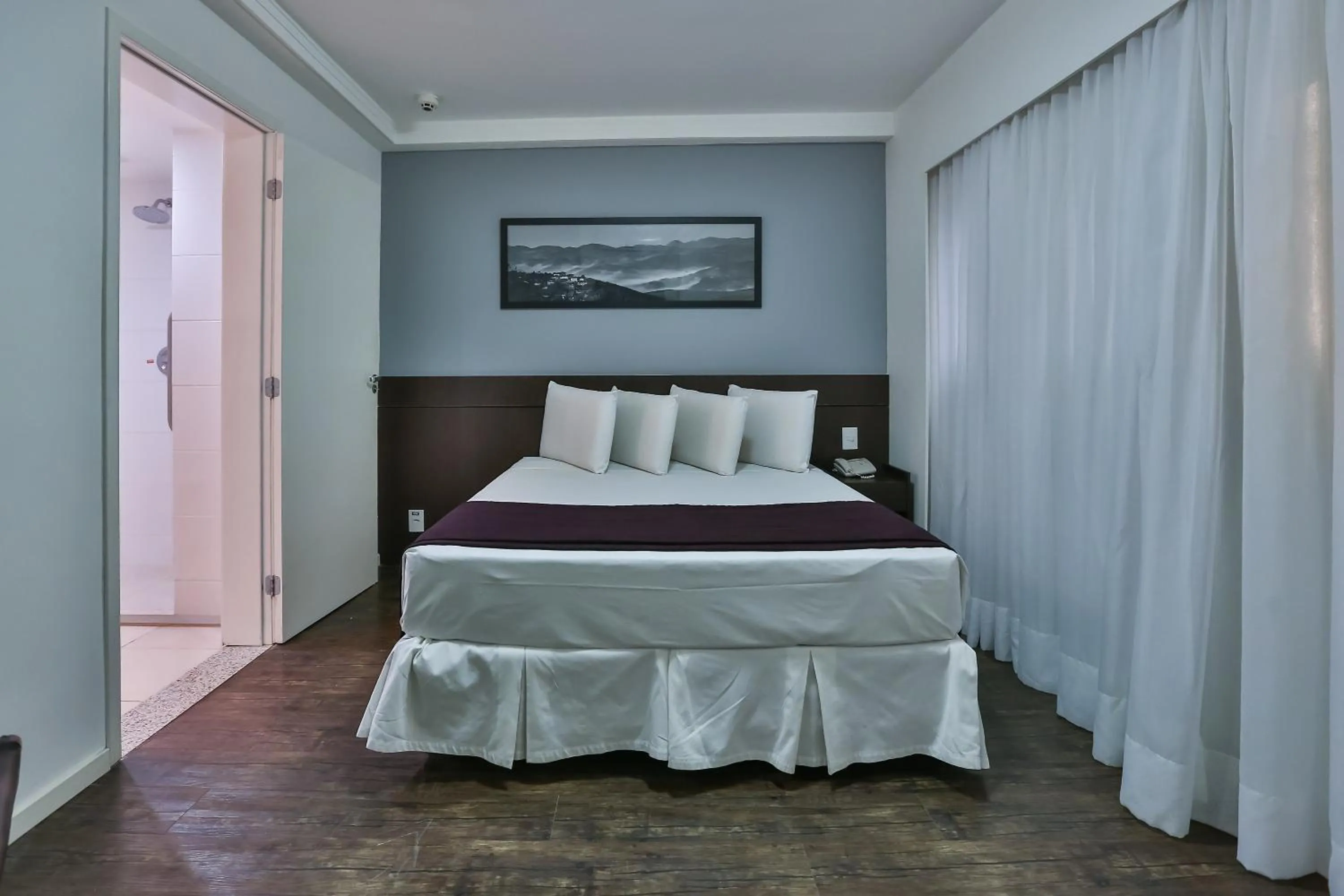 Photo of the whole room, Bed in San Diego Suites Pampulha Hotel - Oficial