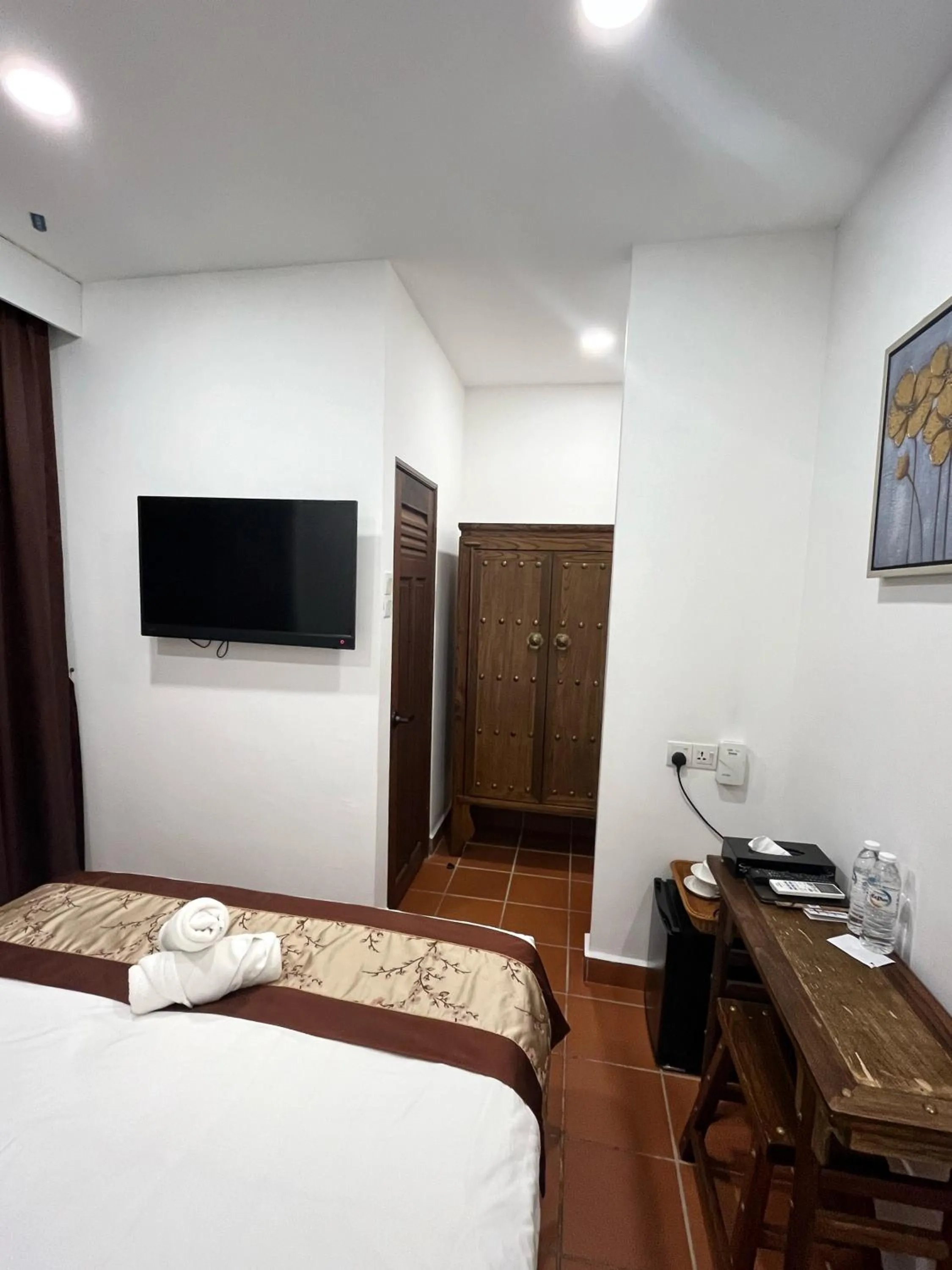 Bed in Mclane Boutique Hotel